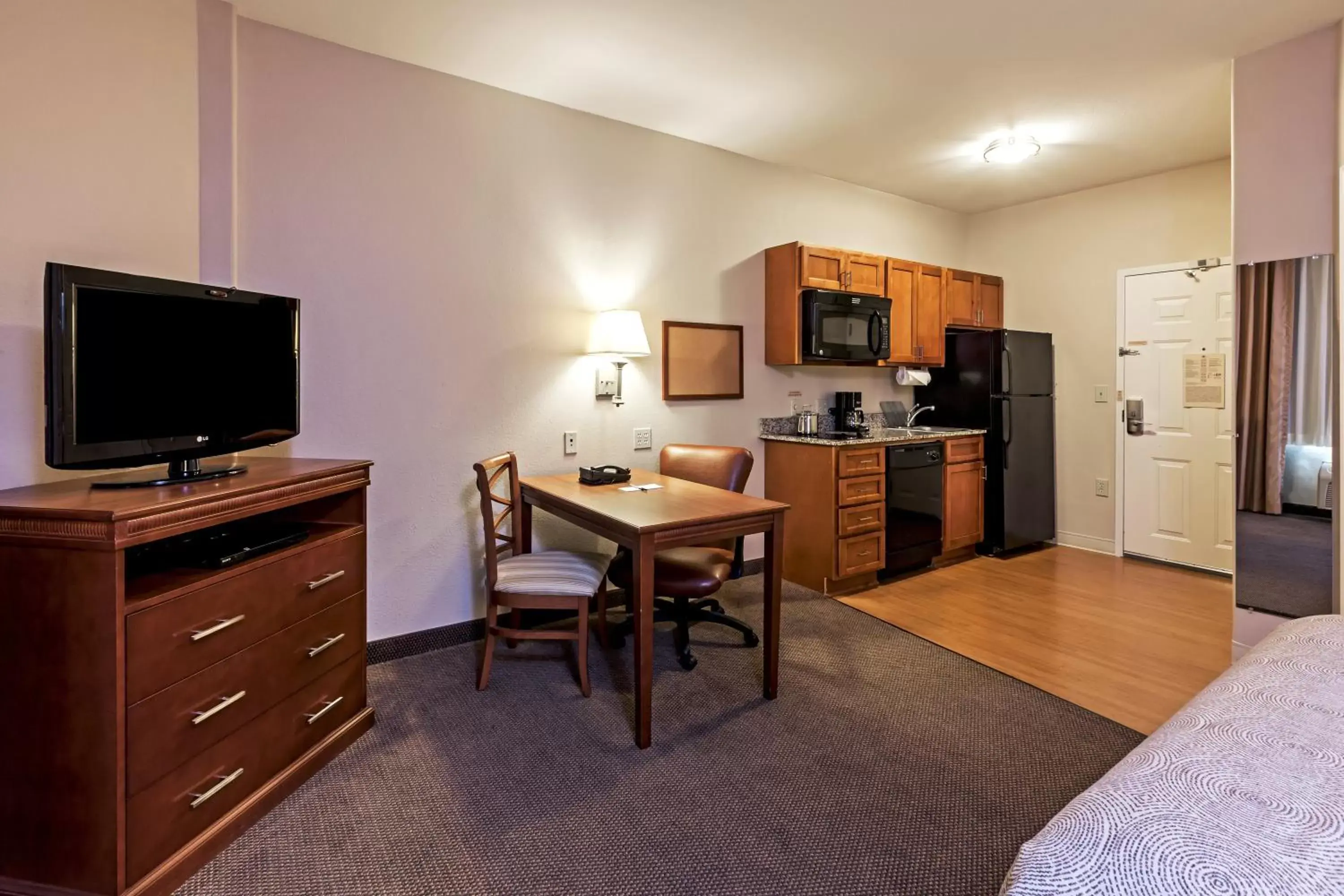 Photo of the whole room, TV/Entertainment Center in Candlewood Suites Baytown, an IHG Hotel