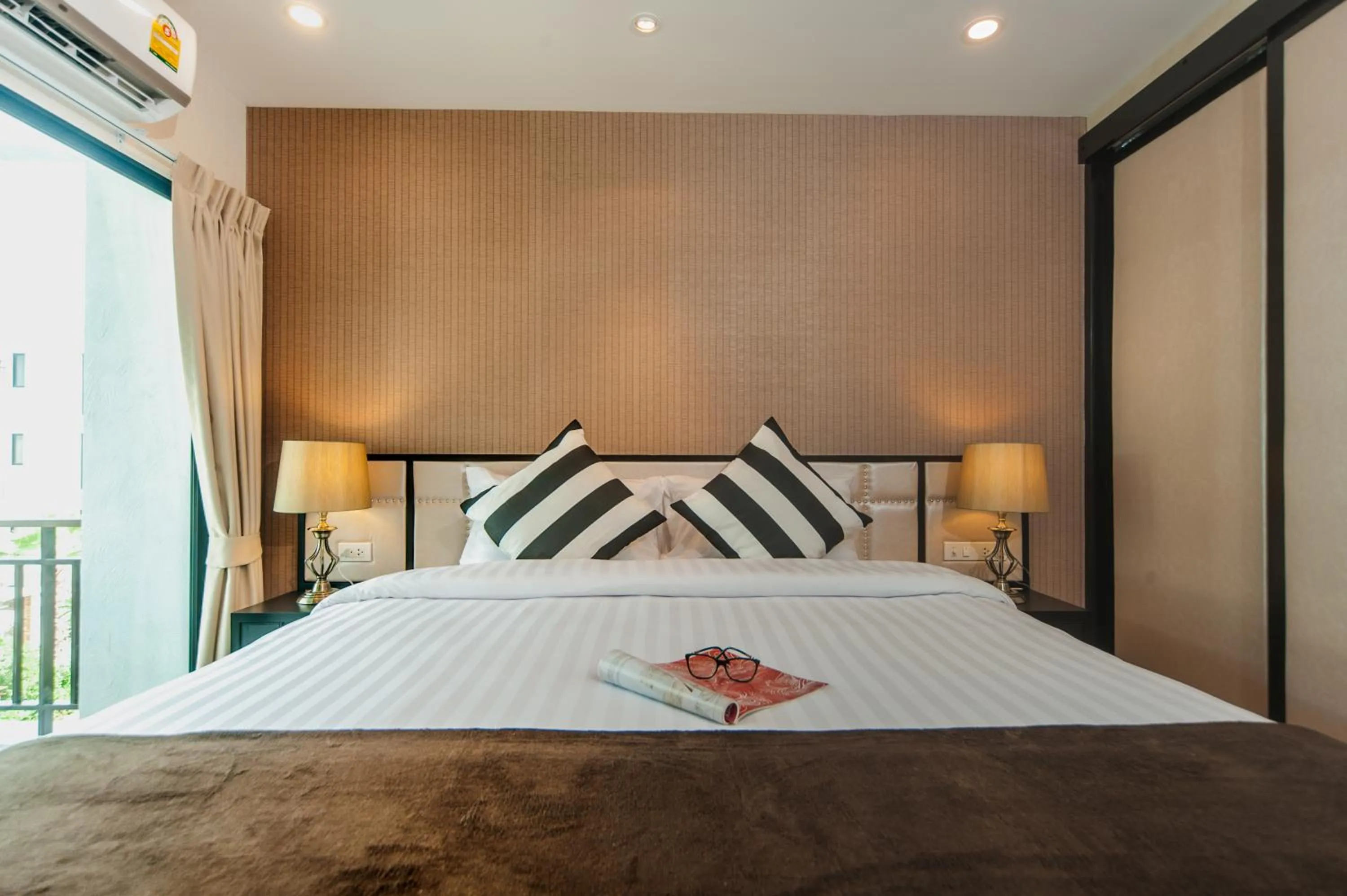 Bedroom, Bed in The Title KR Beach Condotel Rawai Beach