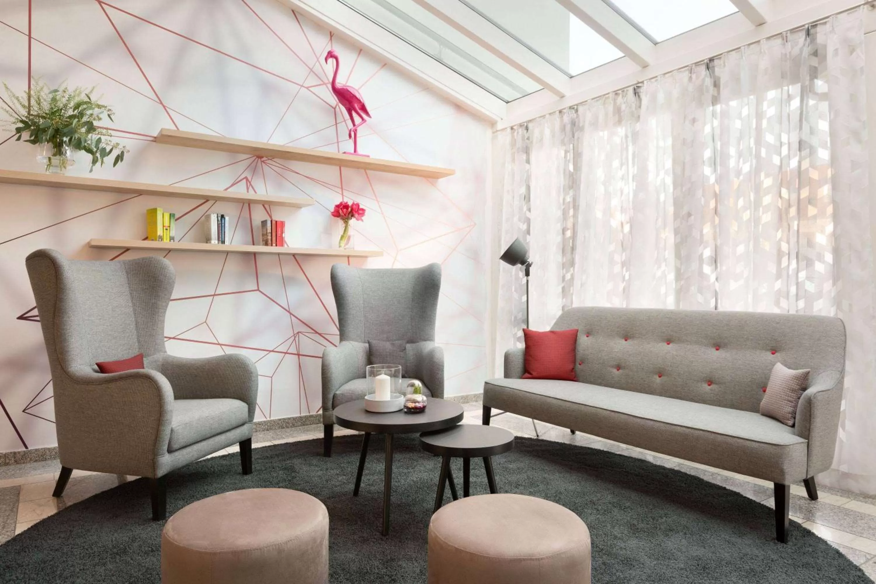 Lobby or reception in Ramada by Wyndham München Airport