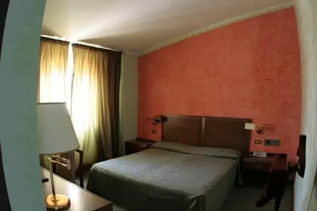 Bed in Astor Hotel Vintage