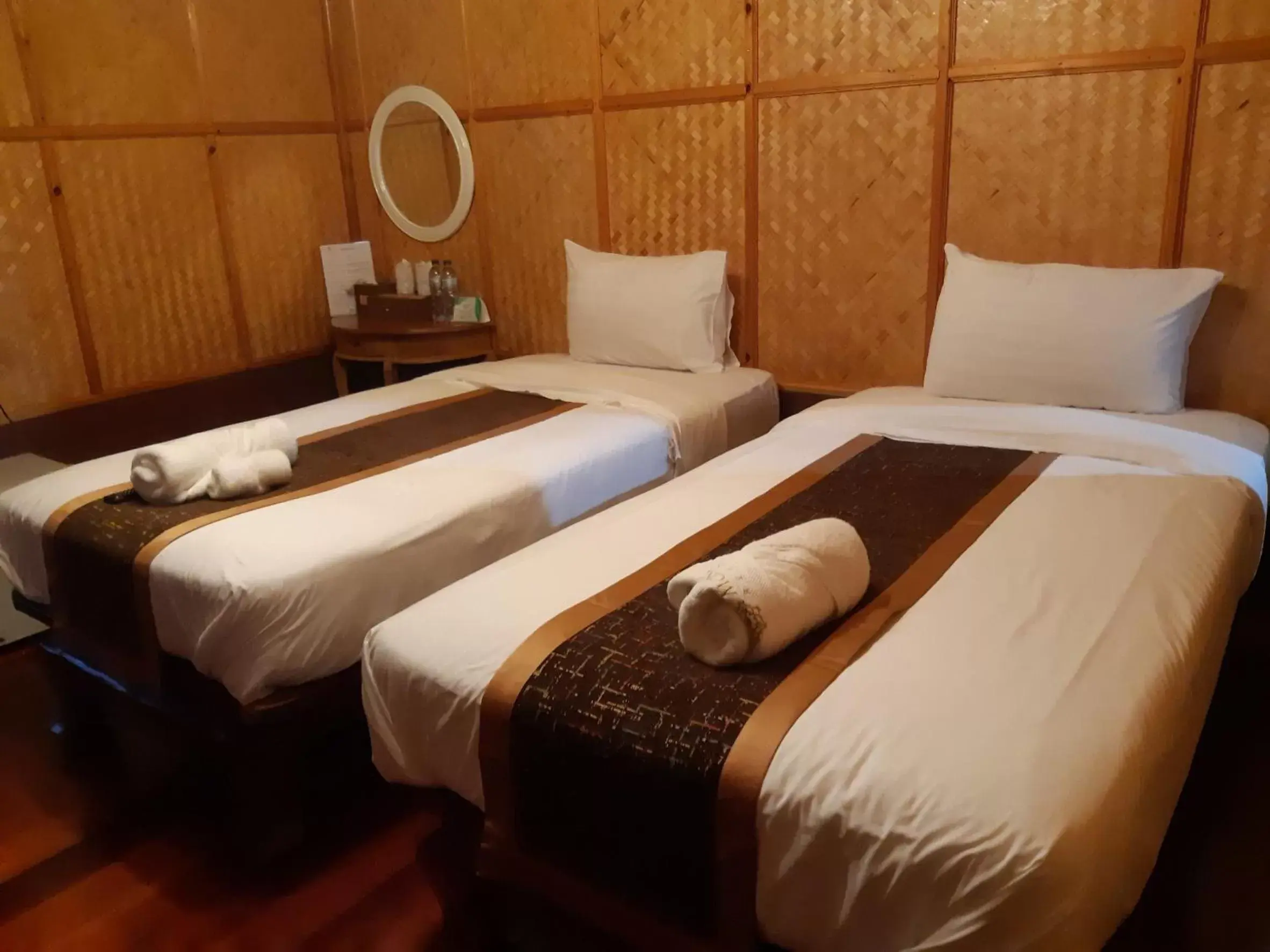 Bed in Montri Resort Donmuang Bangkok