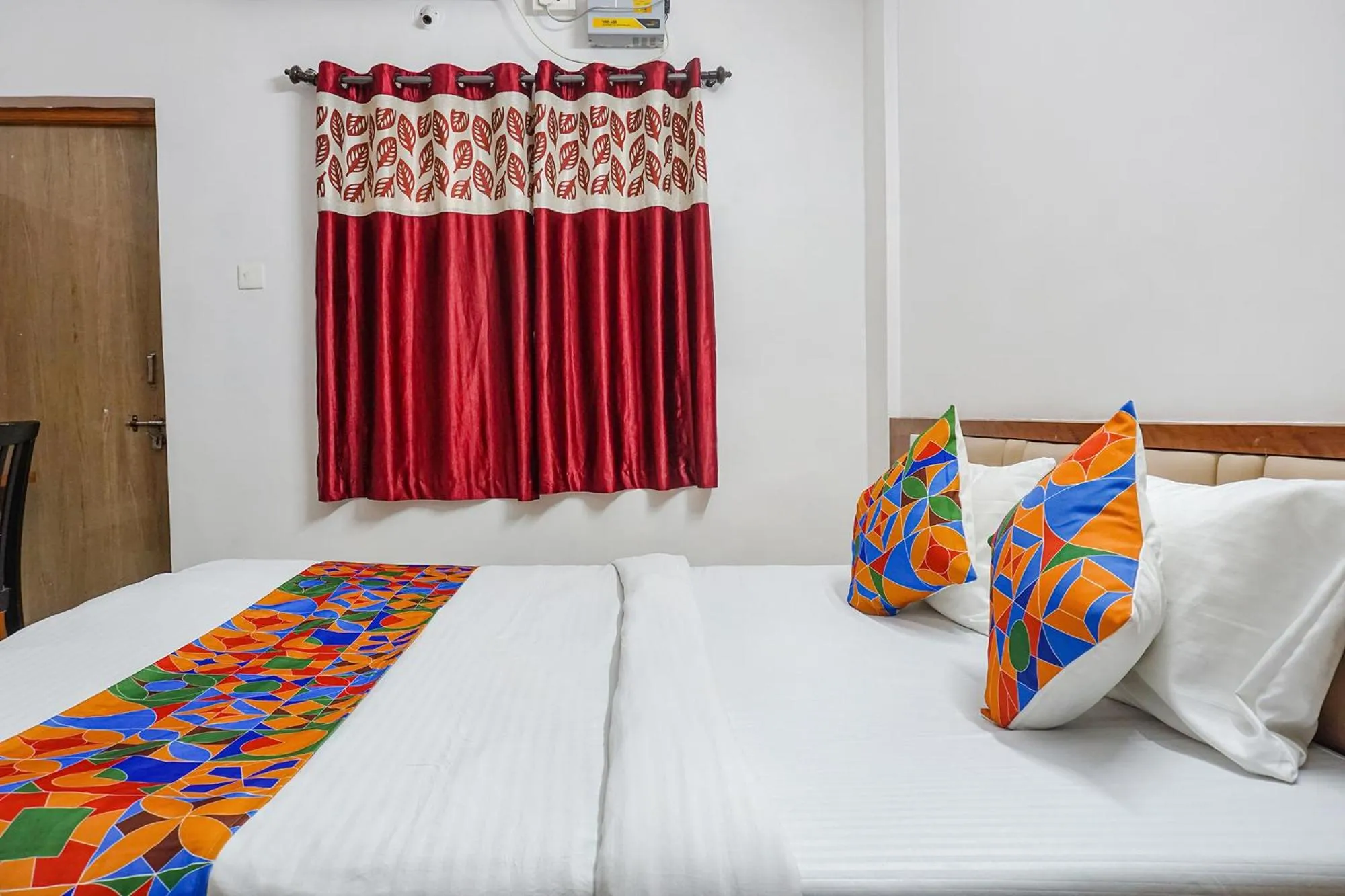 Bed in FabHotel Lake View - Chinmaya Vitthal Mandir