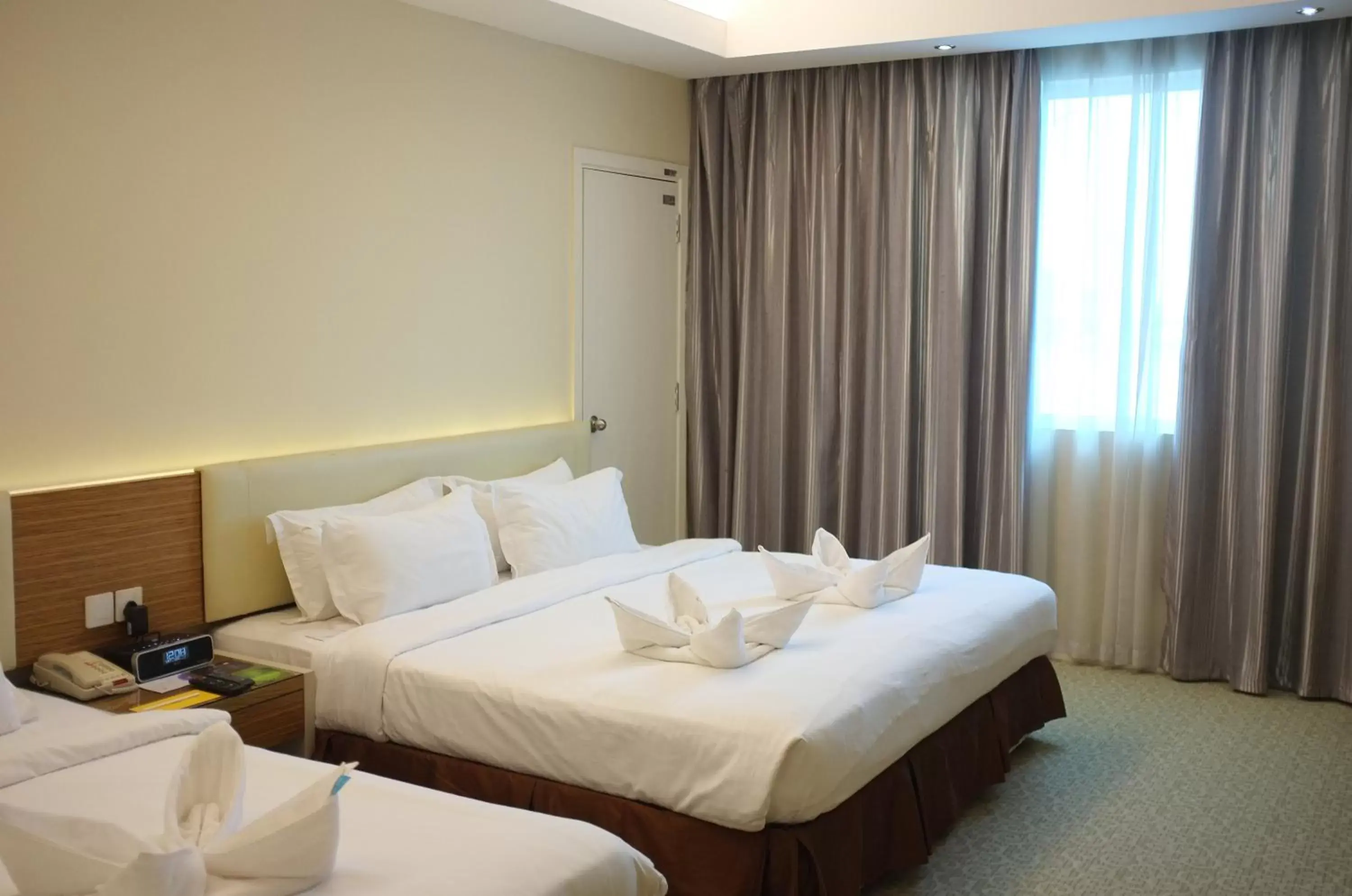 Photo of the whole room, Bed in Ixora Hotel Penang