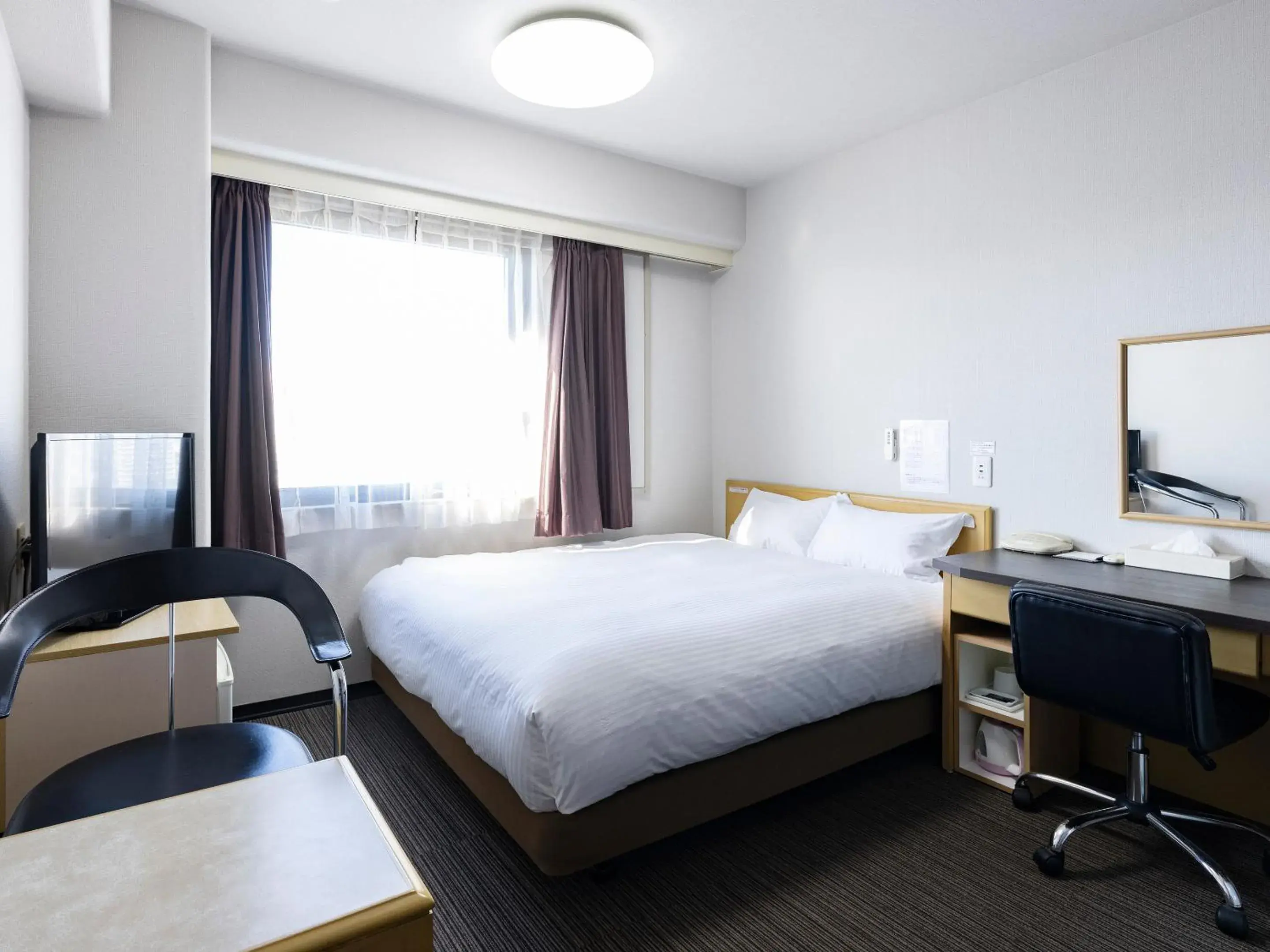Bed in Hotel Wing International Kumamoto Yatsushiro Bed in Hotel Wing International Kumamoto Yatsushiro