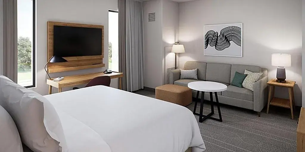Living room, Bed in Staybridge Suites - Houston NW Cypress Crossings , an IHG Hotel