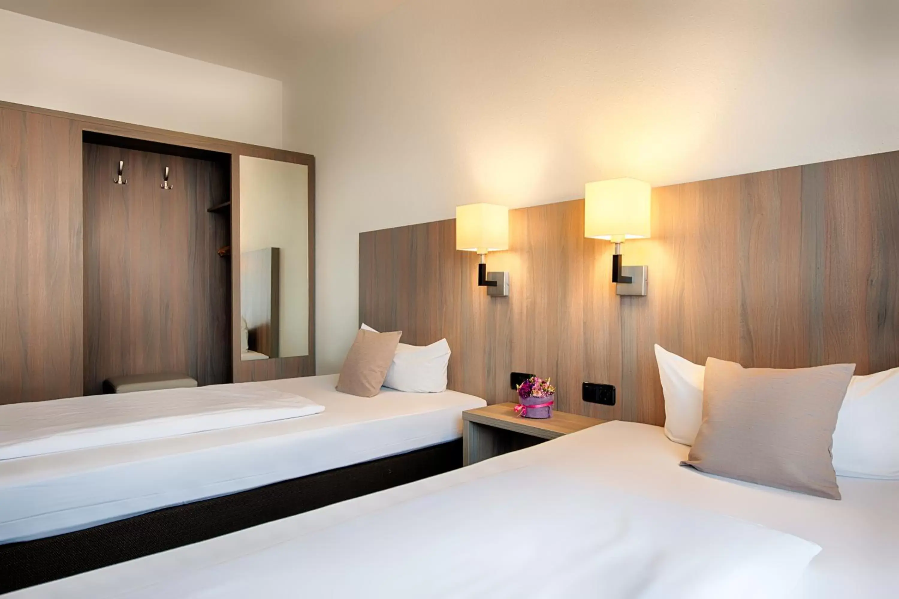 Bed in ACHAT Hotel Bochum Dortmund Bed in ACHAT Hotel Bochum Dortmund