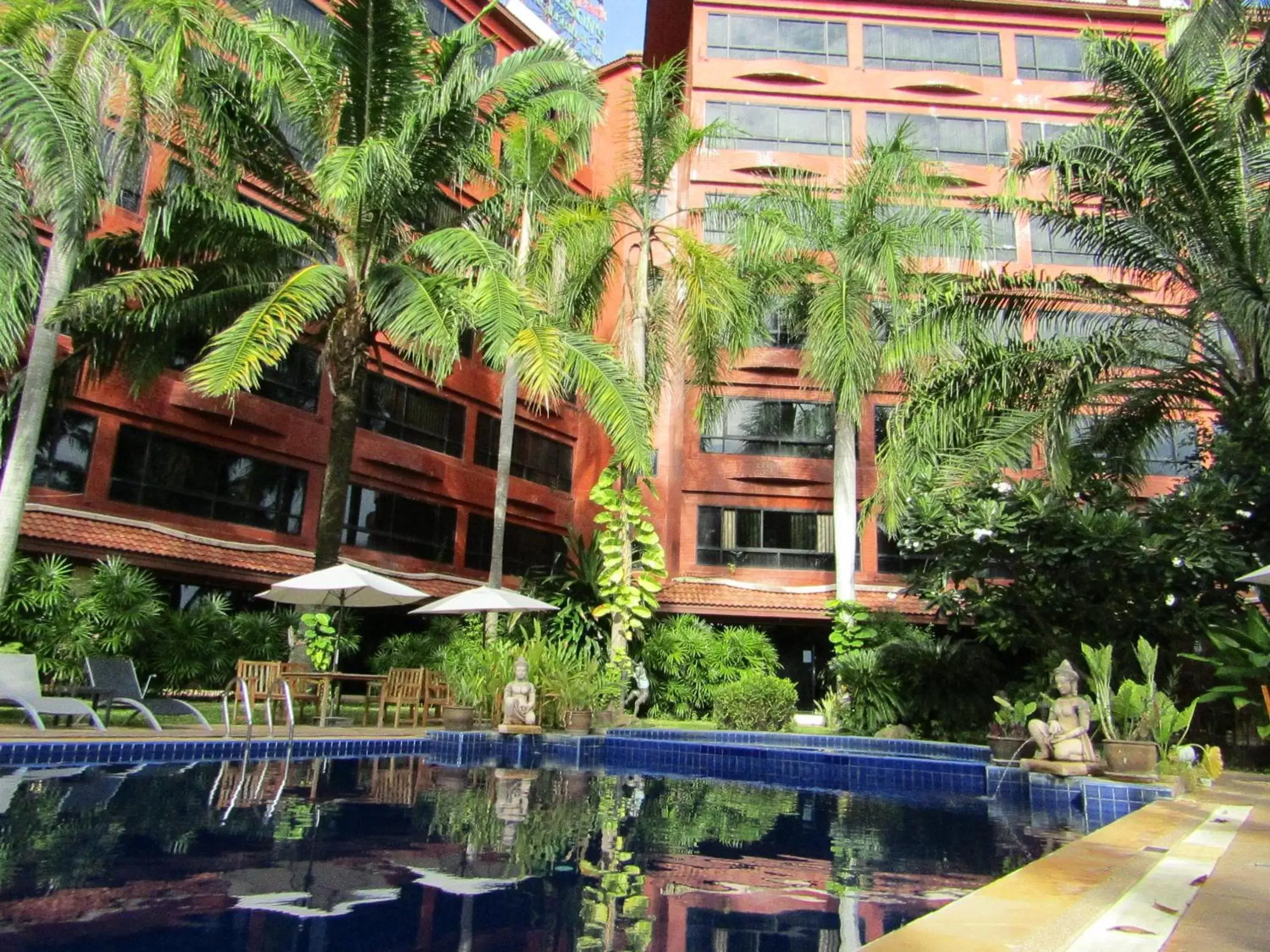 Swimming pool, Property Building in Nova Park Hotel by Compass Hospitality