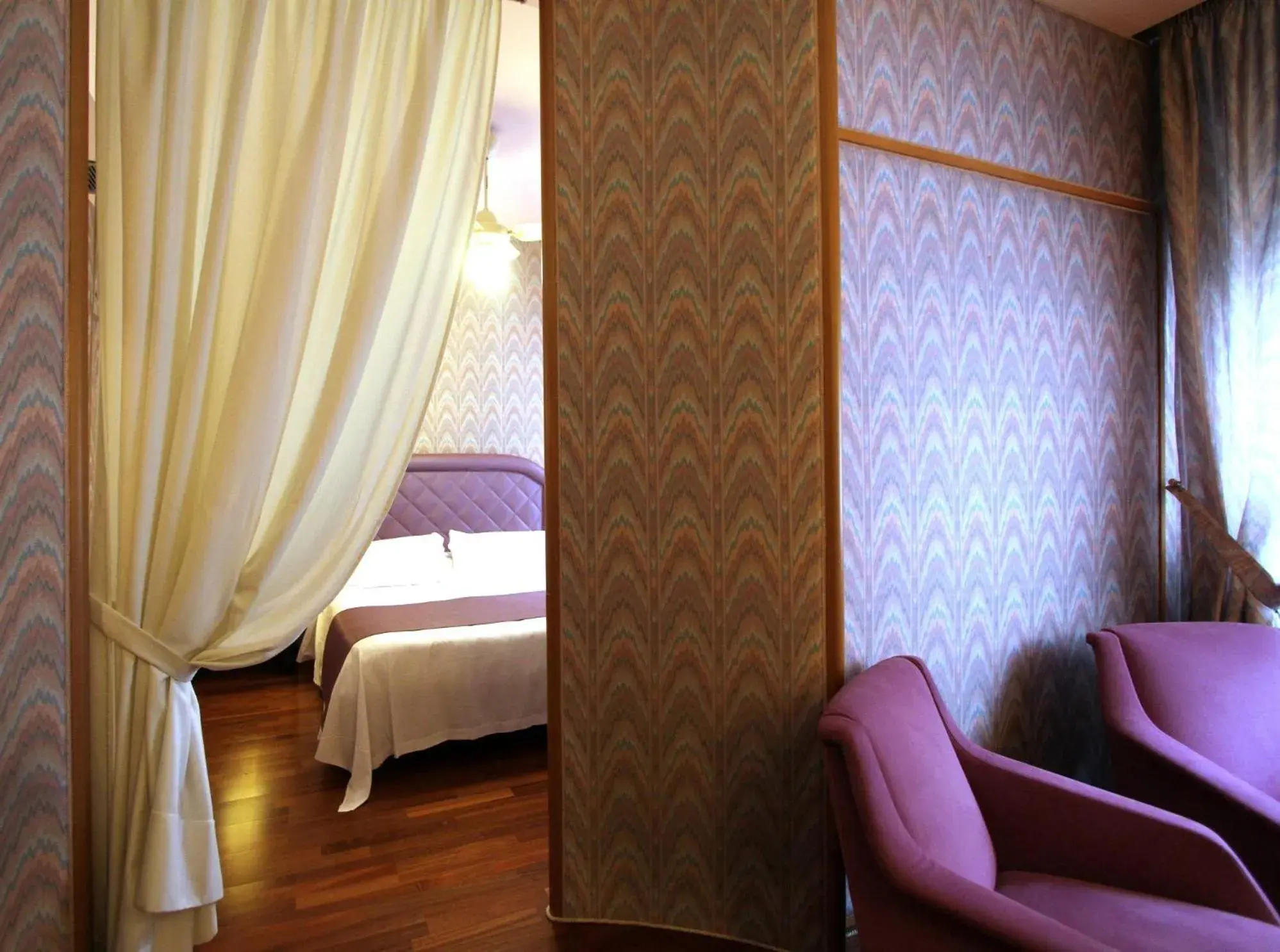 Living room, Bed in Hotel Cicolella