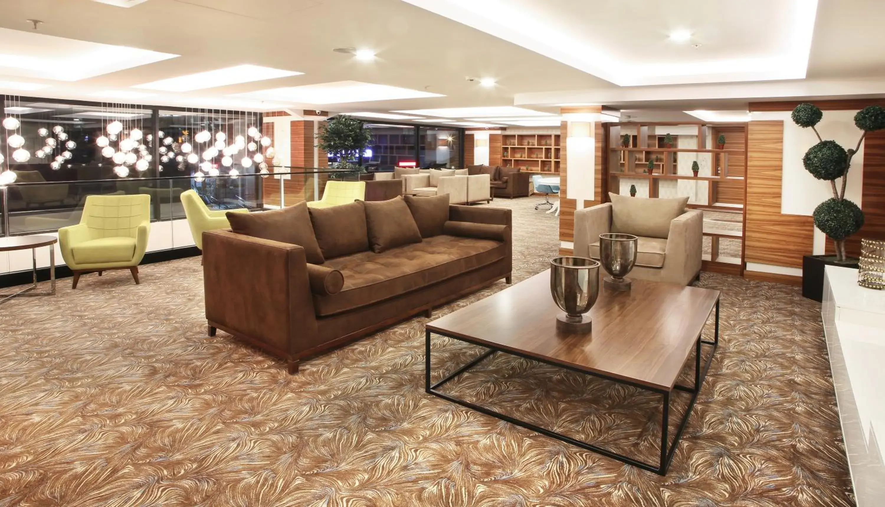 Communal lounge/ TV room, Lobby/Reception in Mard-inn Hotel