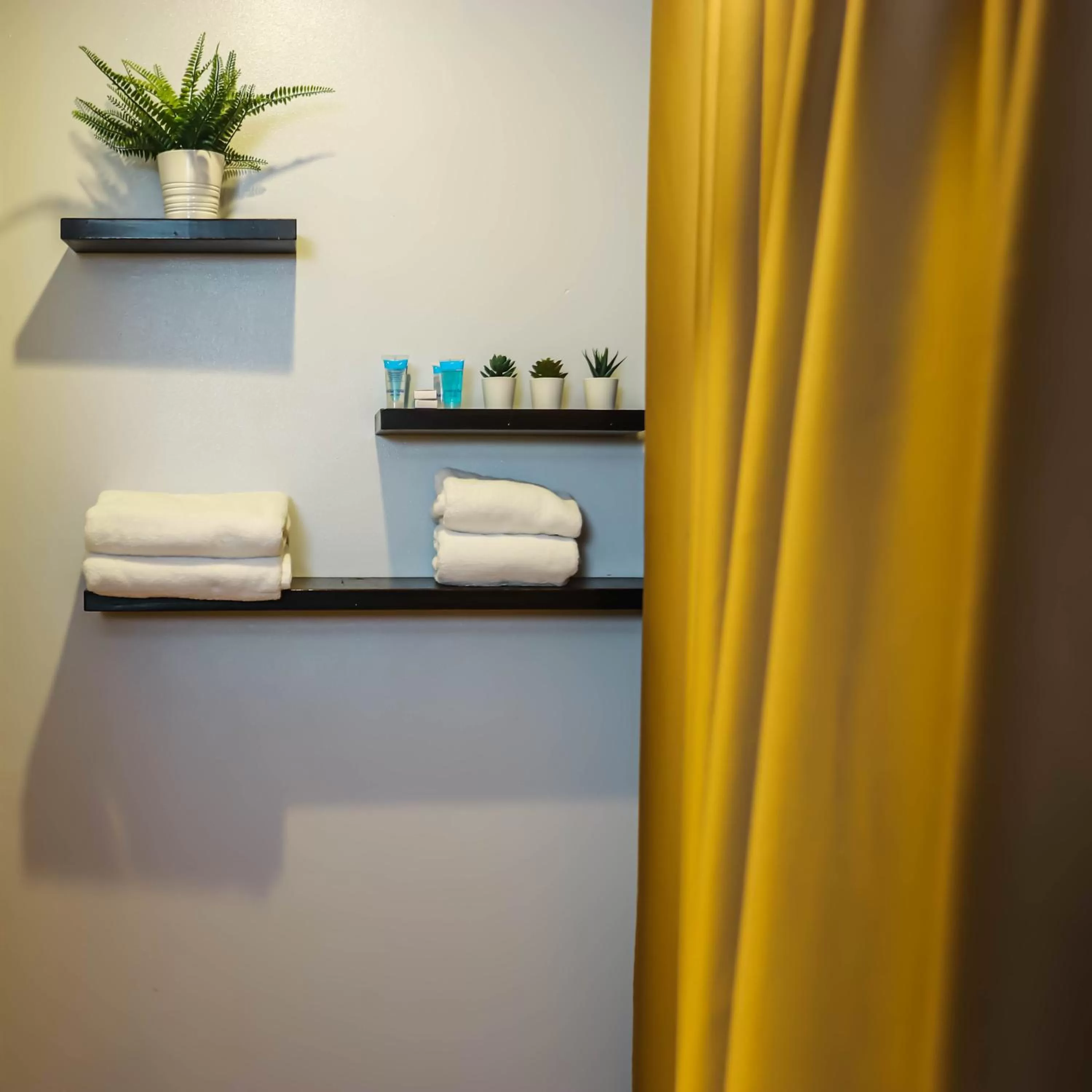 towels in NewCity Hotel & Suites