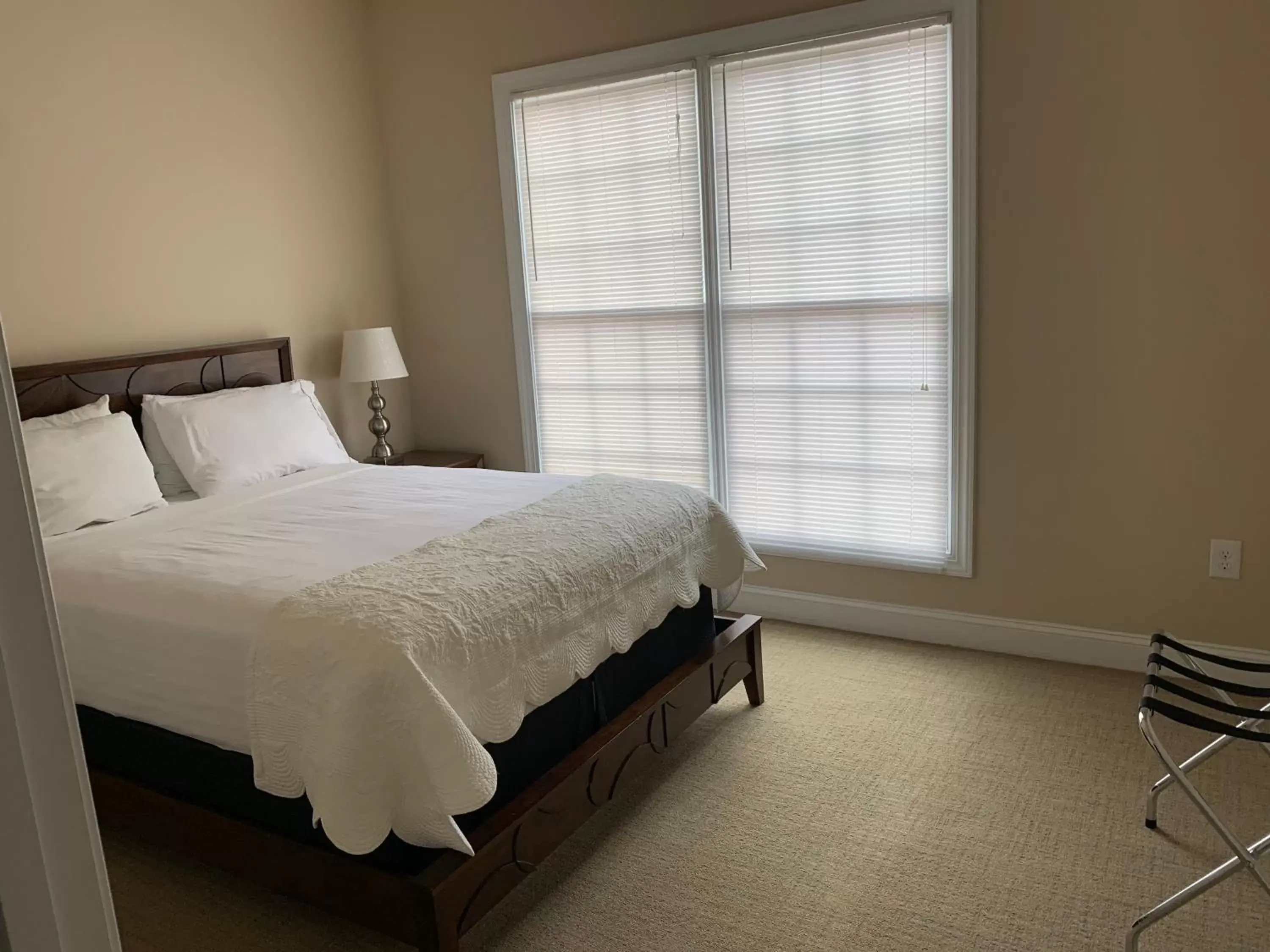 Bed in Cottages and Suites at River Landing