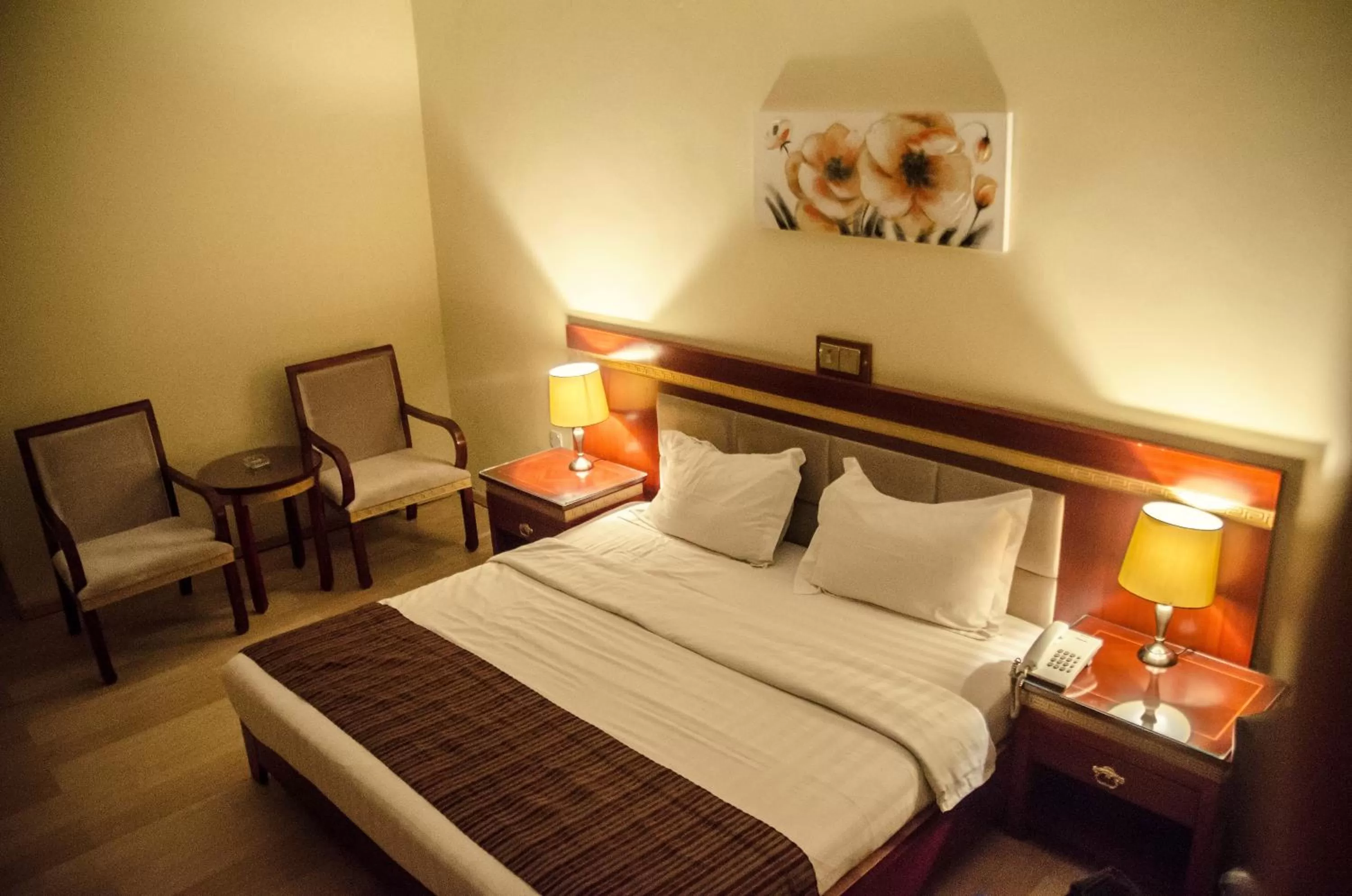 Seating area, Bed in Hotel Rosebud