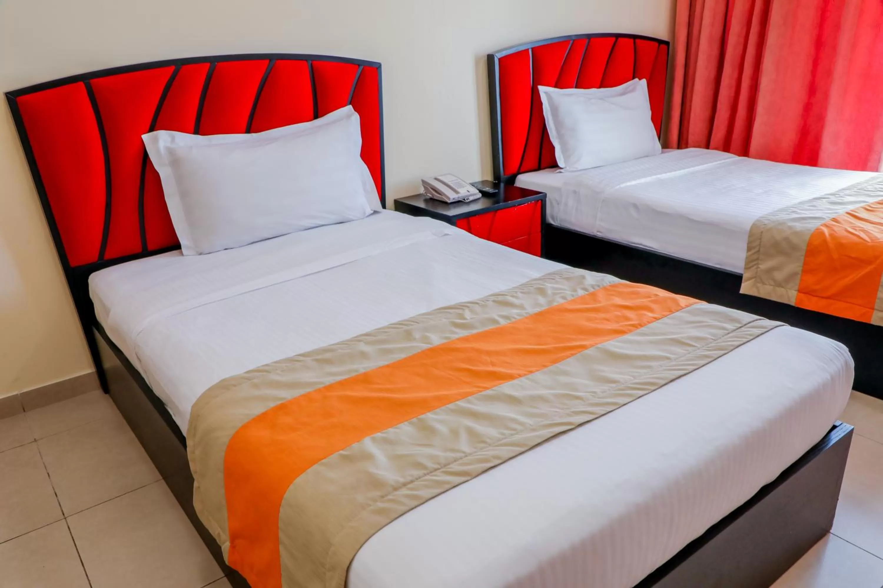 Bed in Wescott Plaza Hotel Apartments LLC Formerly West Zone Plaza Hotel Apts