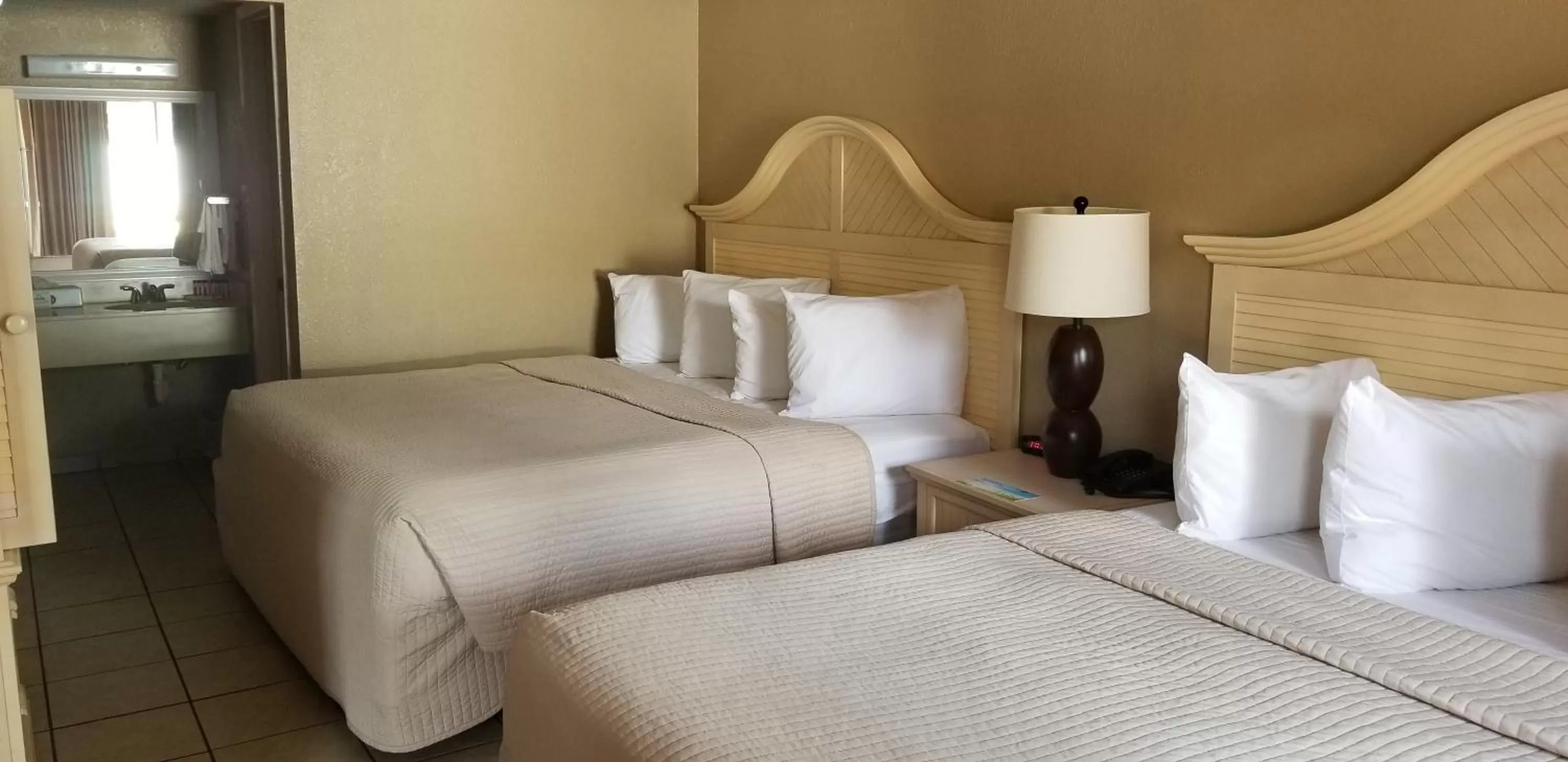 Bed in Days Inn by Wyndham Cocoa Cruiseport West At I-95/524