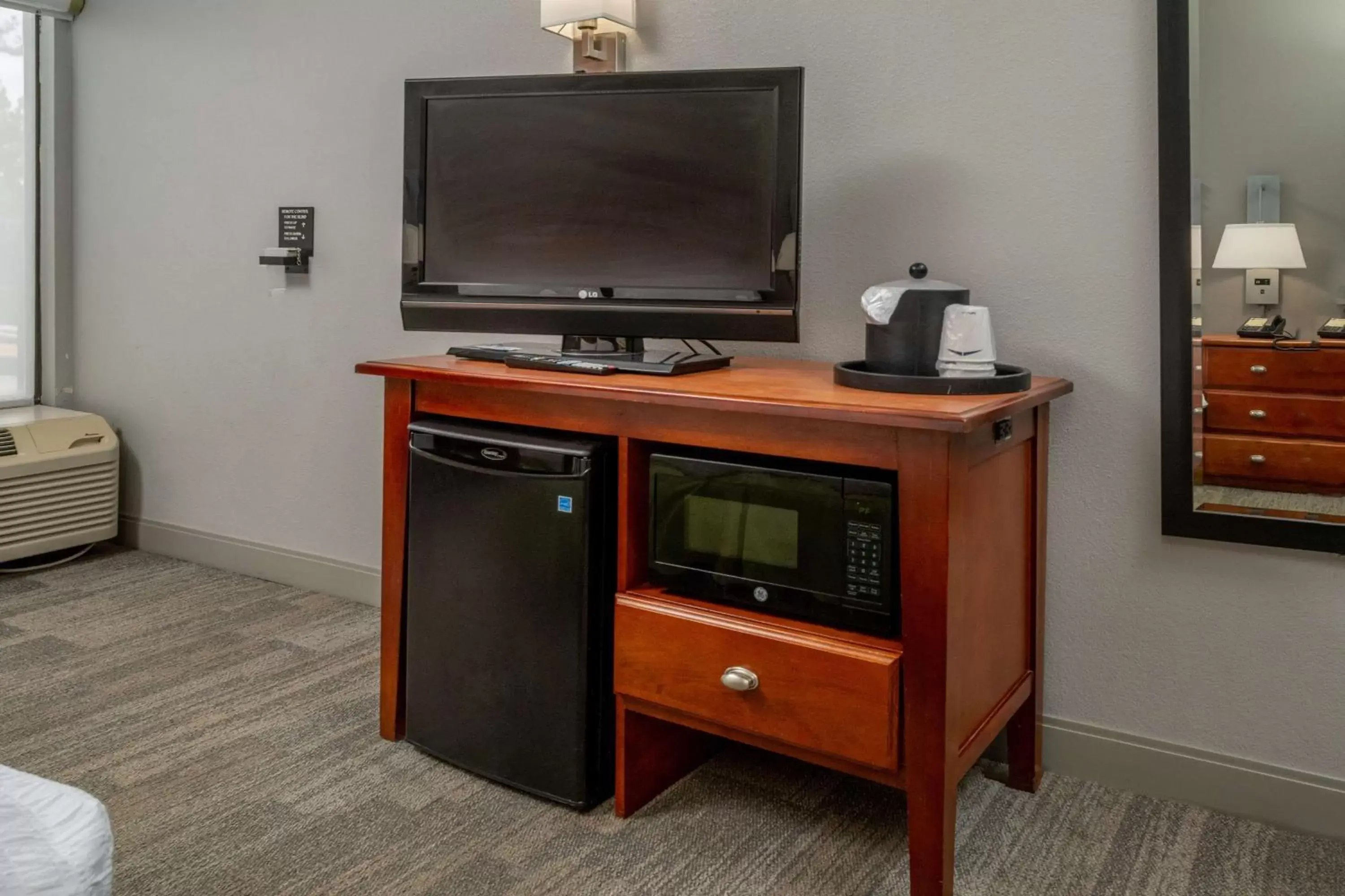 Photo of the whole room, TV/Entertainment Center in Hampton Inn Charleston Downtown