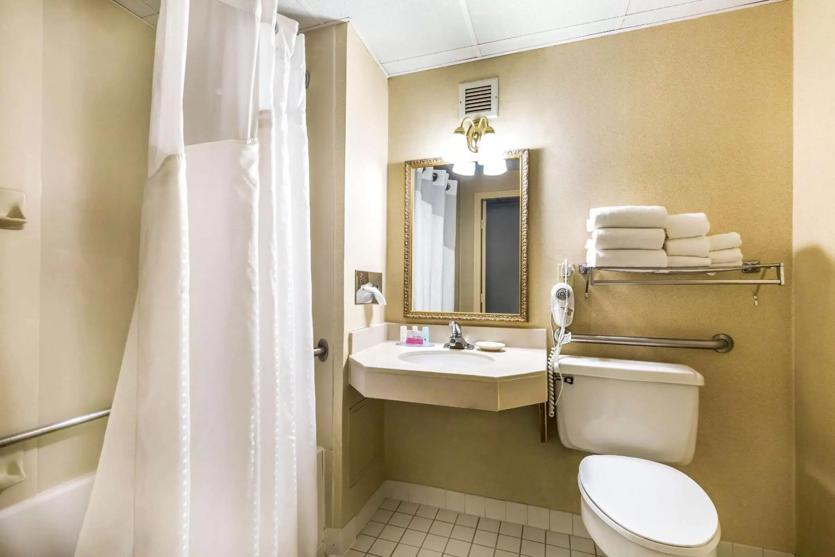 Photo of the whole room, Bathroom in Clarion Inn Frederick Event Center