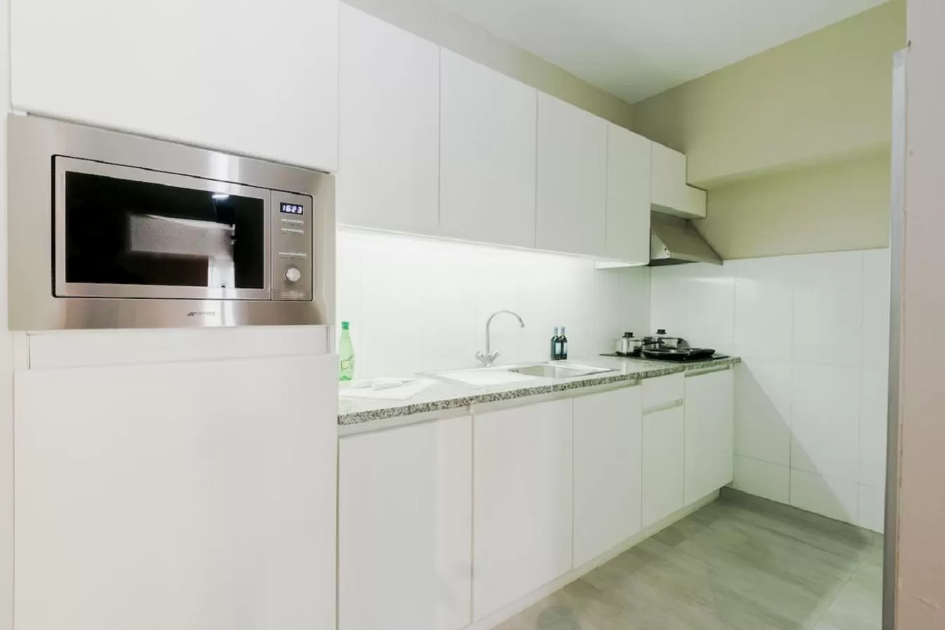 Kitchen or kitchenette in Arass Hôtel & Business Flats