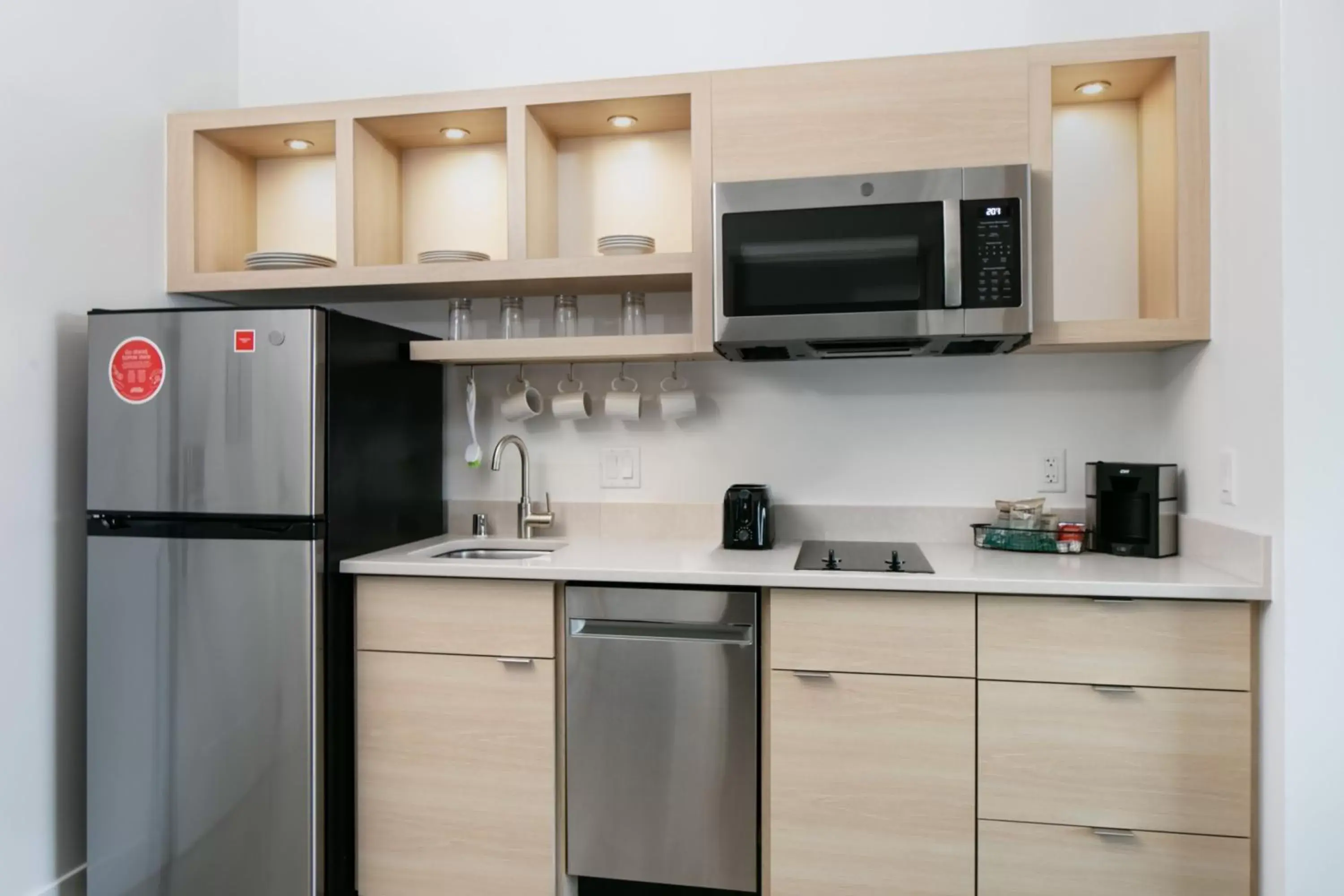 Photo of the whole room, Kitchen/Kitchenette in TownePlace Suites by Marriott Madison West, Middleton