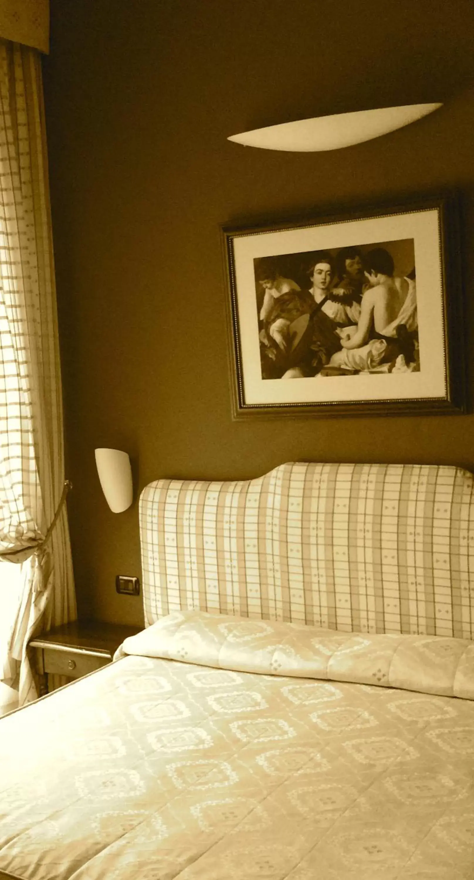 Decorative detail, Bed in Hotel Caravaggio