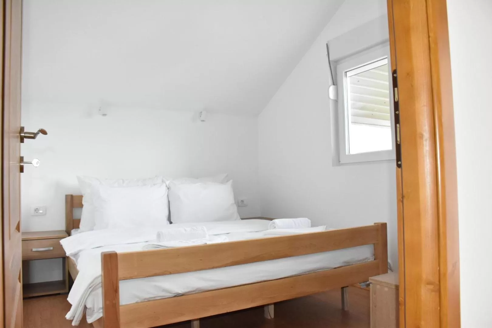 Bed in OSTROG Aparthotel KOLIBA-VLASTNIŠTVO MANASTIRA OSTROG