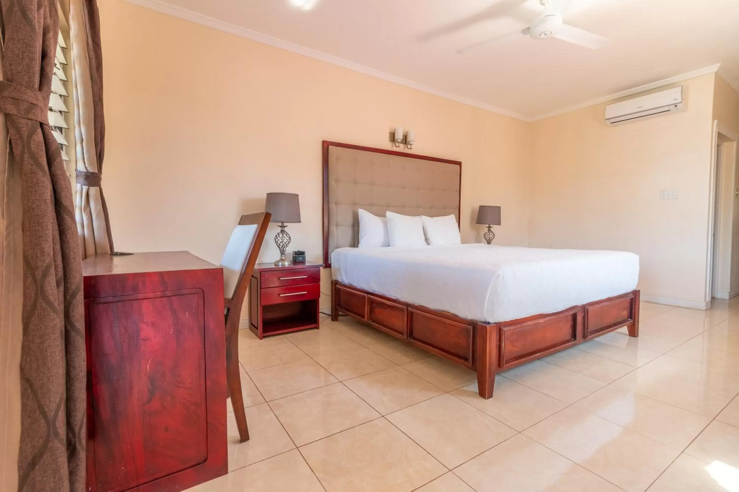 Photo of the whole room, Bed in Travellers Beach Resort