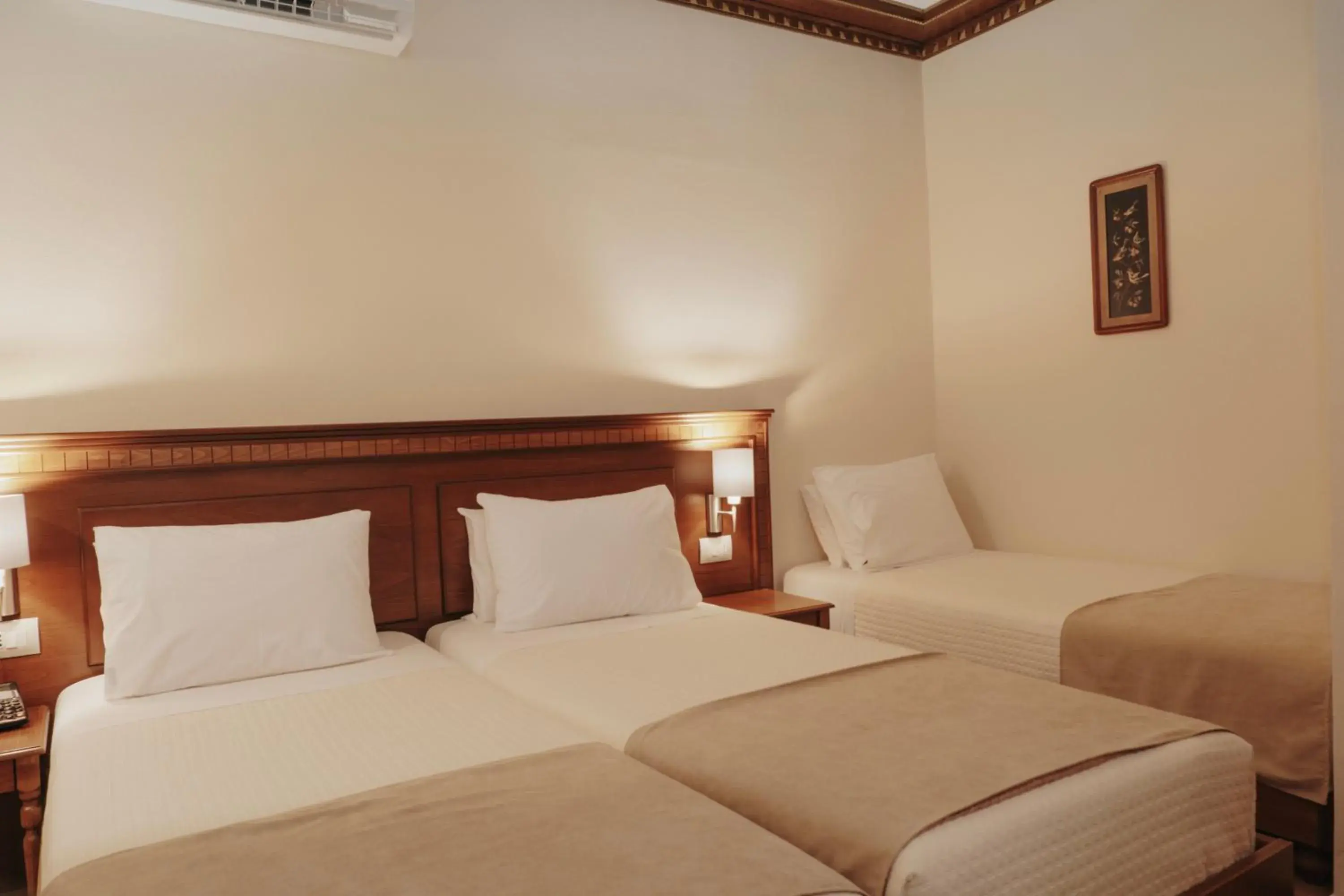 Bed in Hotel Argjiro