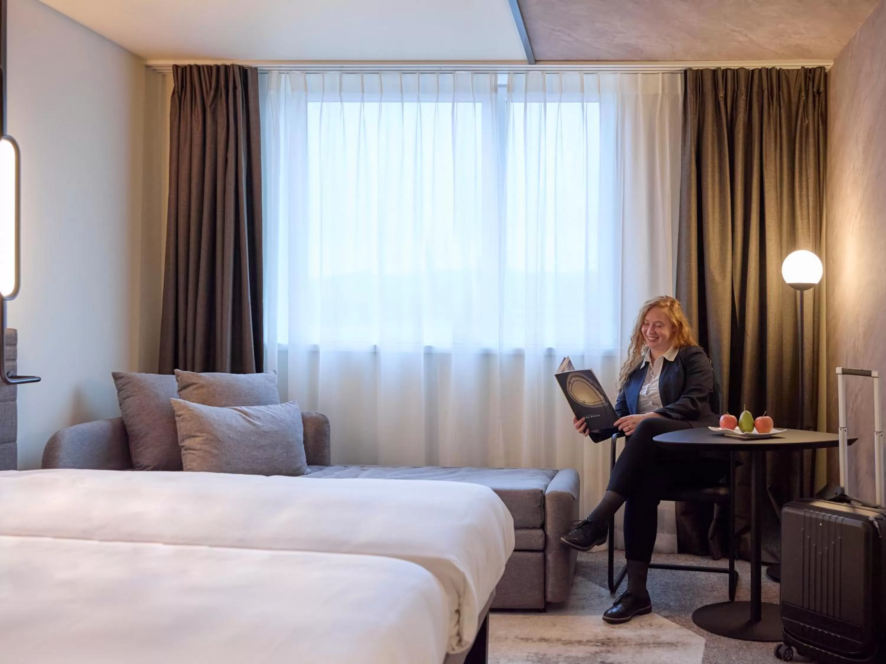 Photo of the whole room, Bed in Novotel Bern Expo