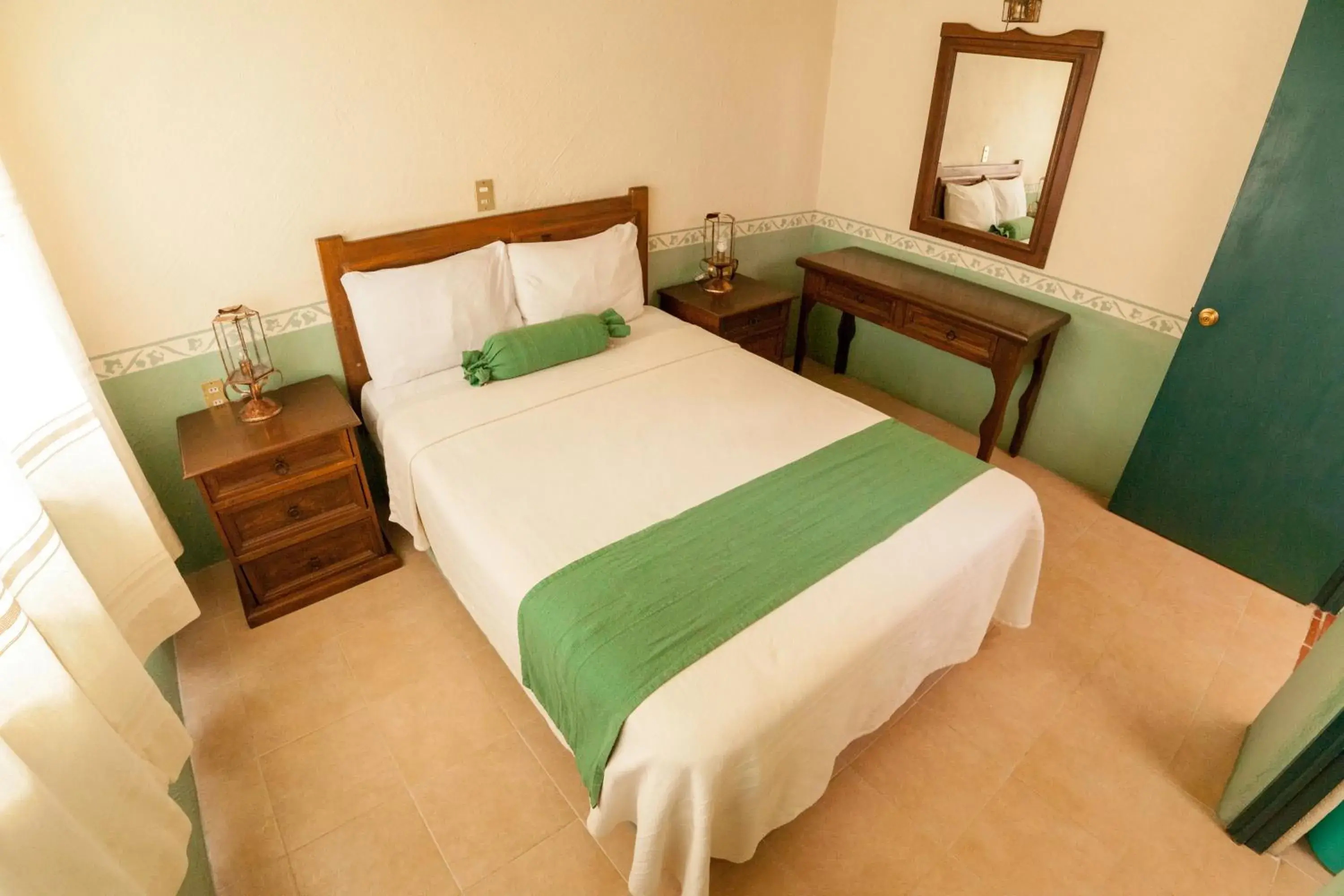 Bed in Villas del Sol Hotel & Bungalows