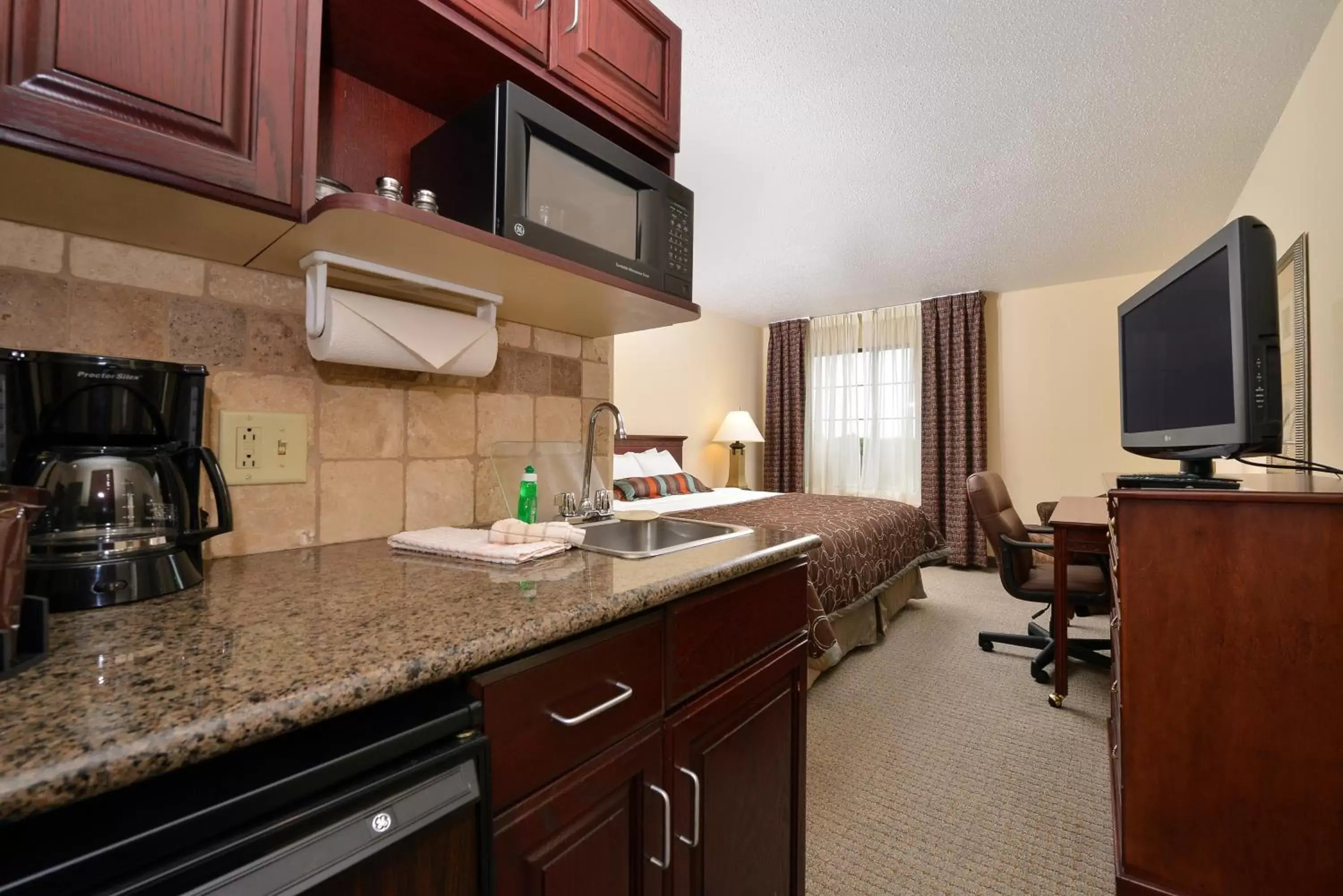 Kitchen or kitchenette, Kitchen/Kitchenette in Staybridge Suites West Des Moines, an IHG Hotel