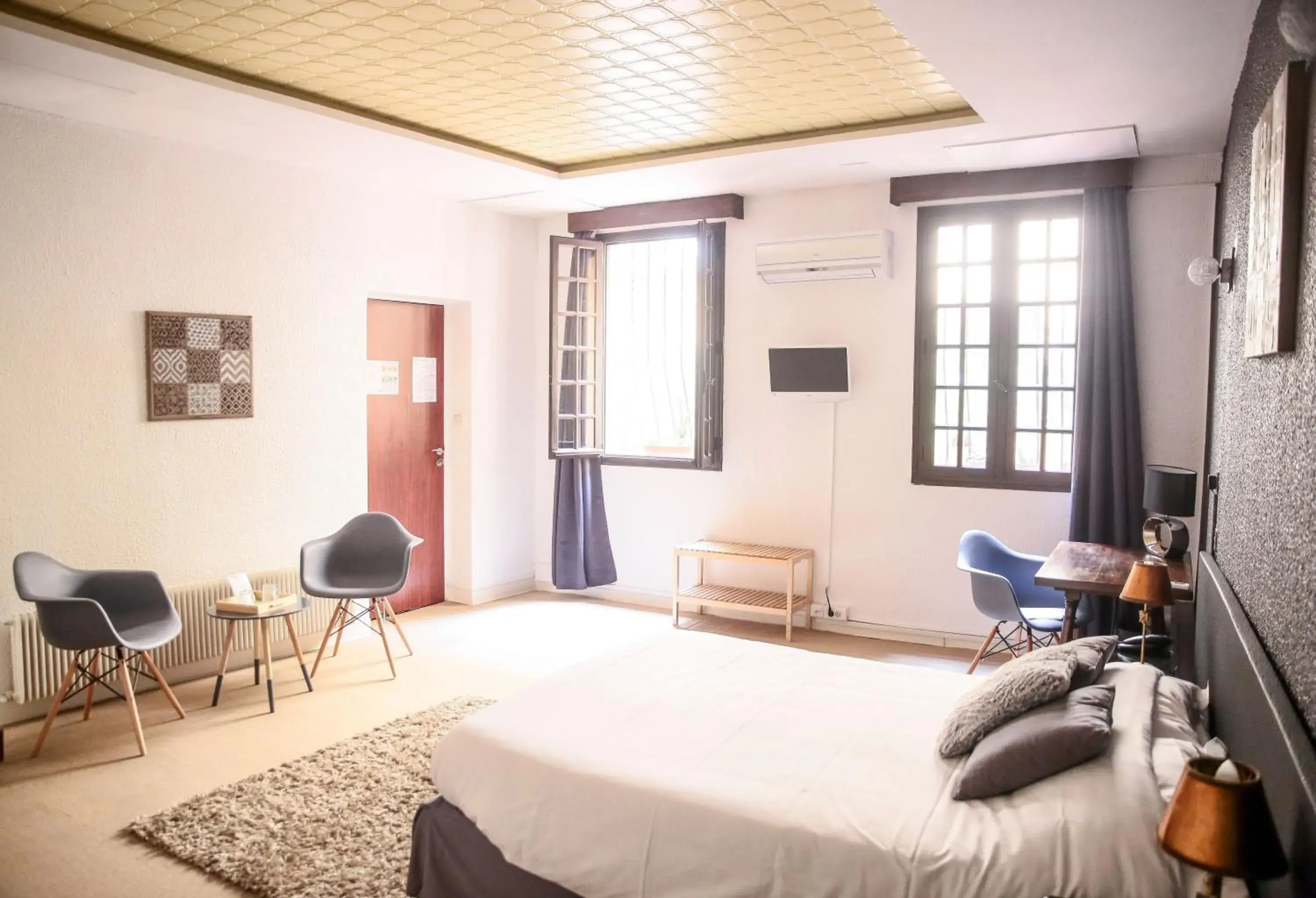 Bedroom in Hôtel De La Loge