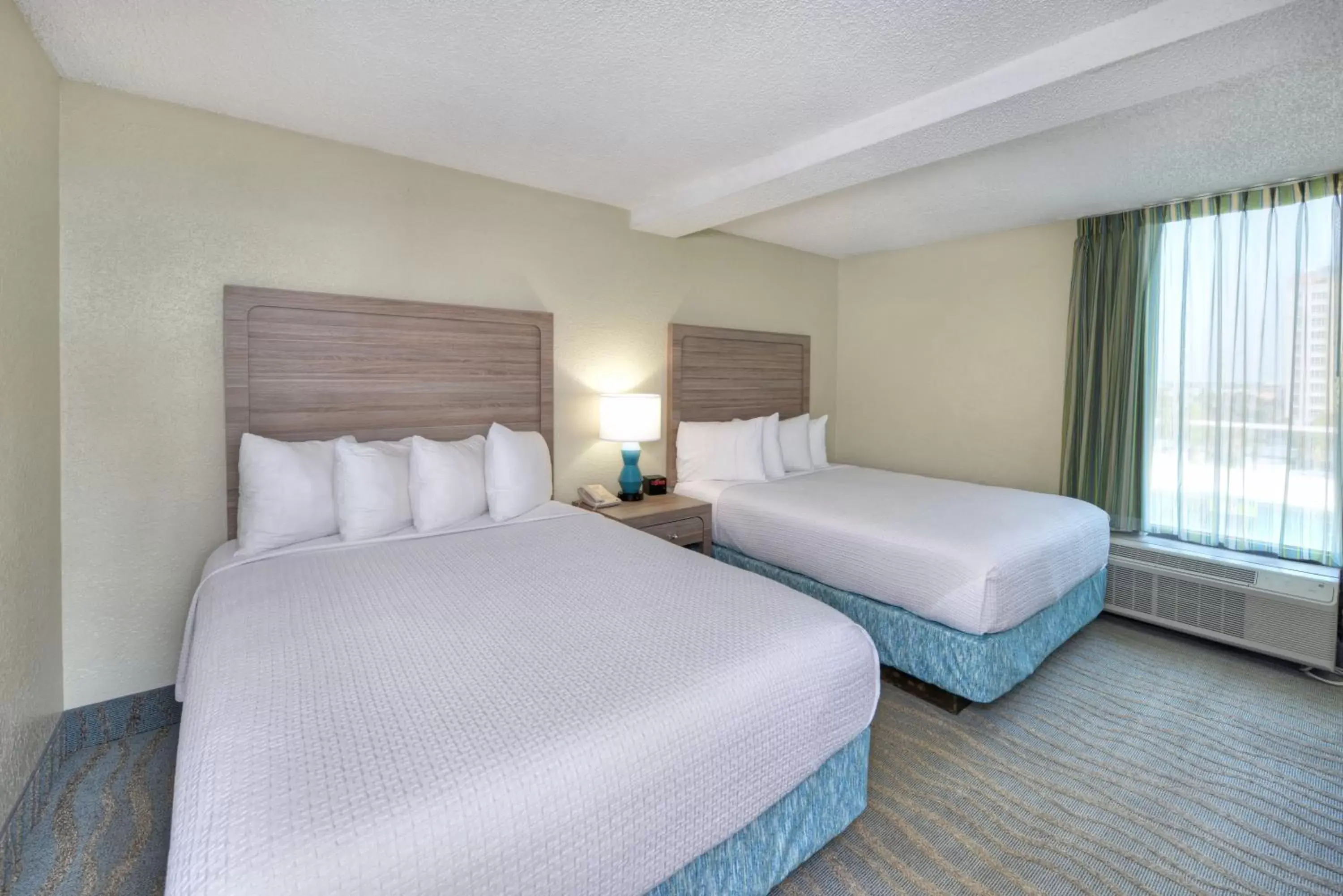 Bedroom, Bed in El Caribe Resort and Conference Center