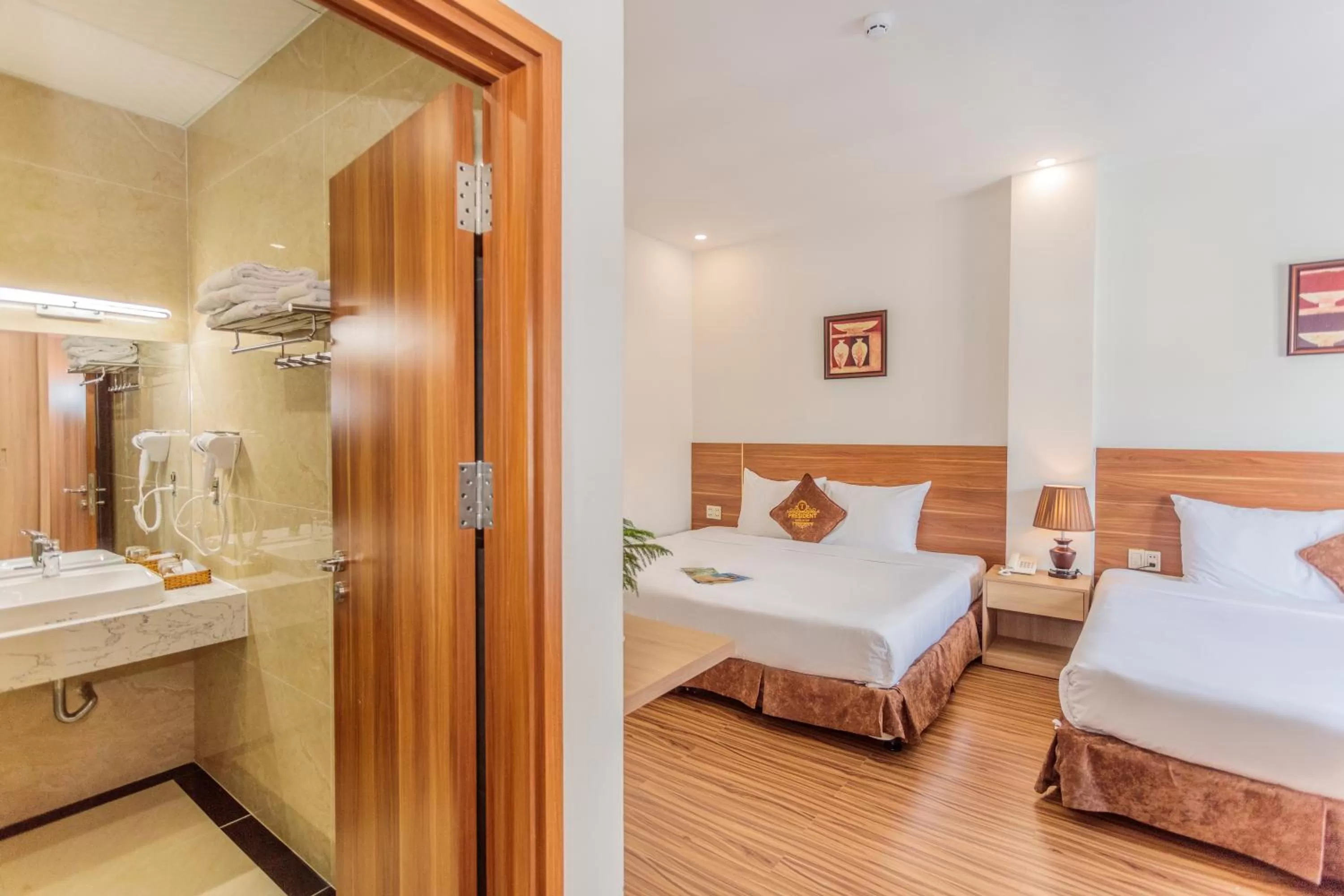 Bed, Bathroom in President Hotel