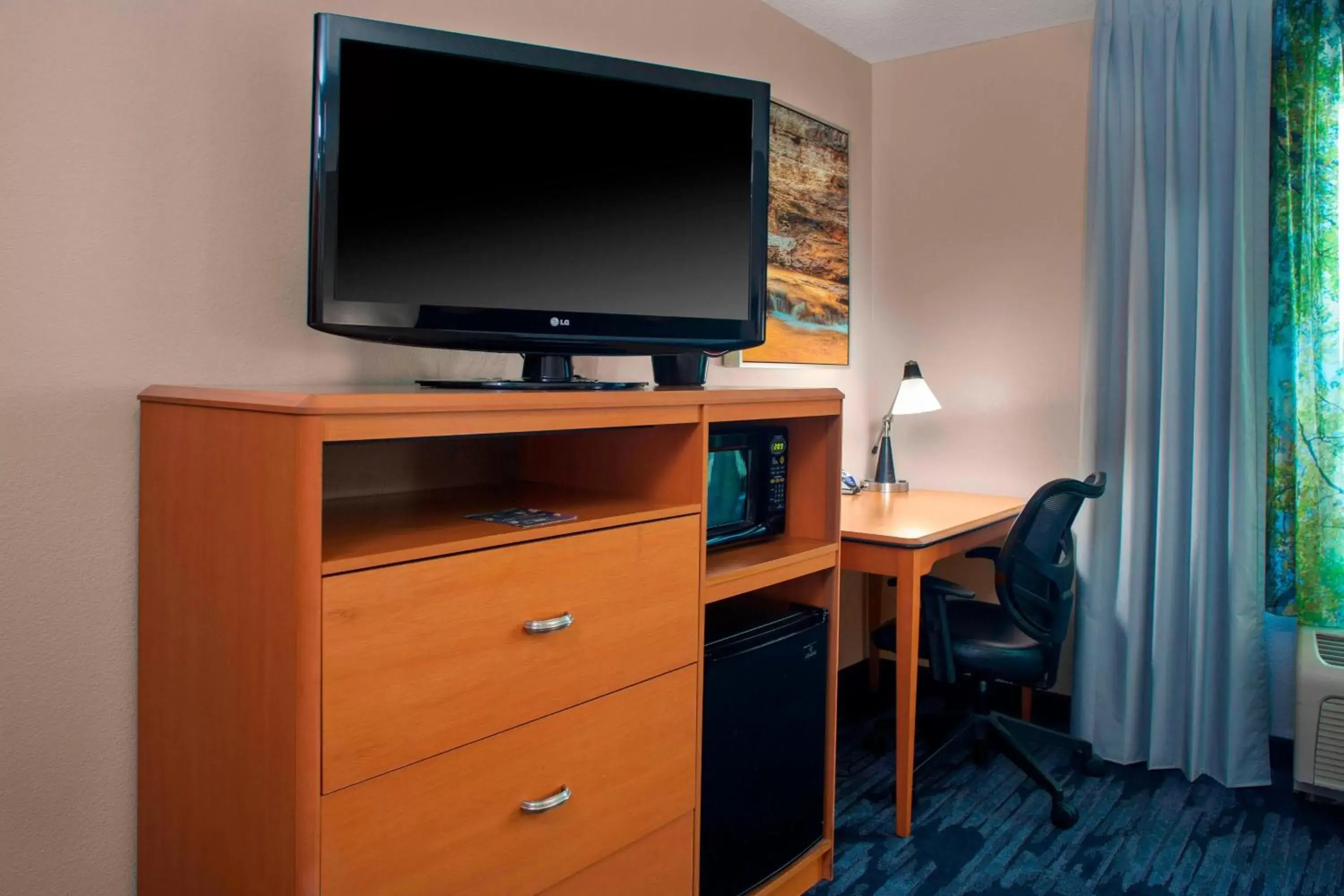 Photo of the whole room, TV/Entertainment Center in Fairfield Inn and Suites by Marriott Montgomery EastChase