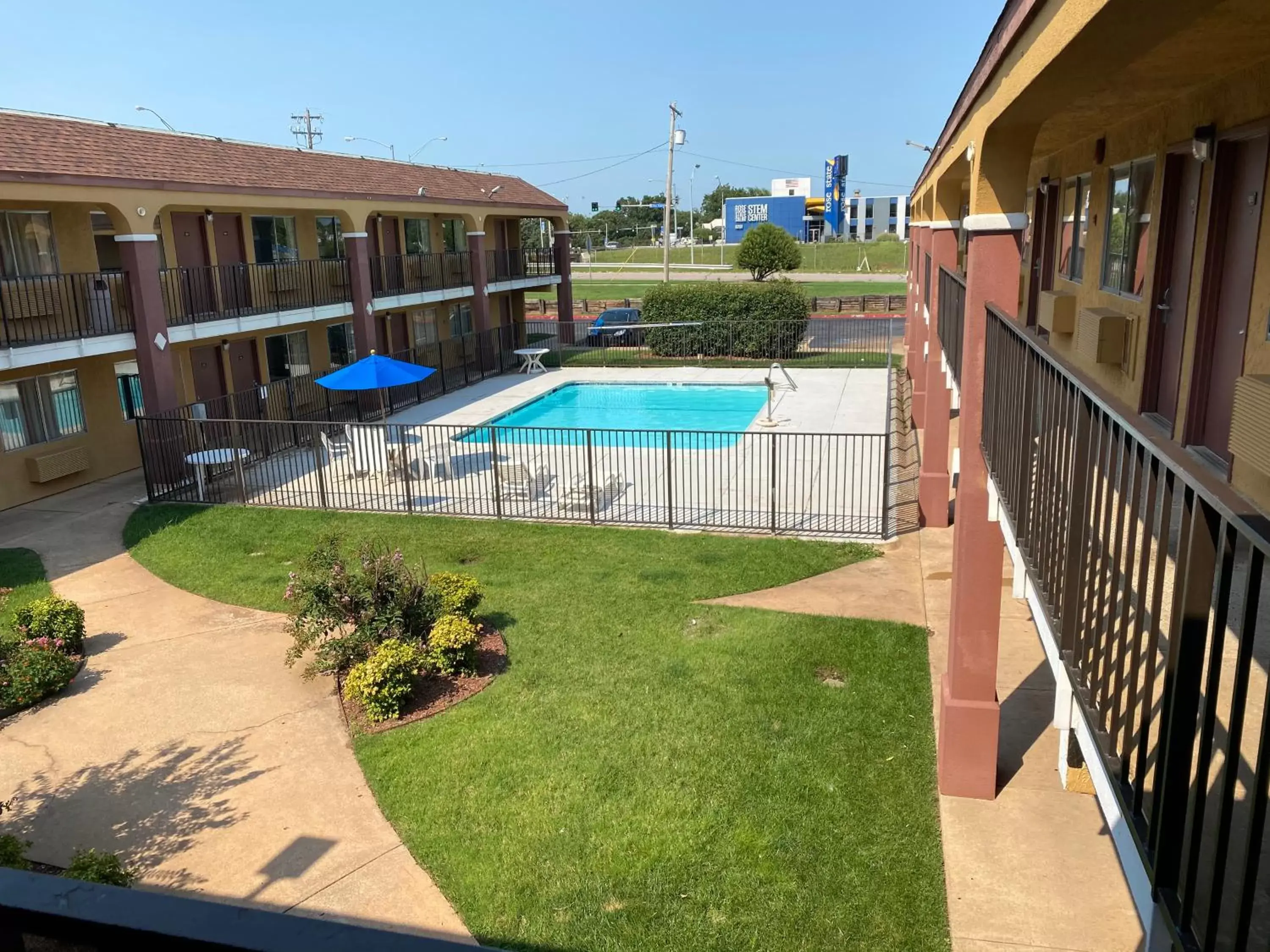 Property building, Swimming Pool in Super 8 by Wyndham Midwest City OK