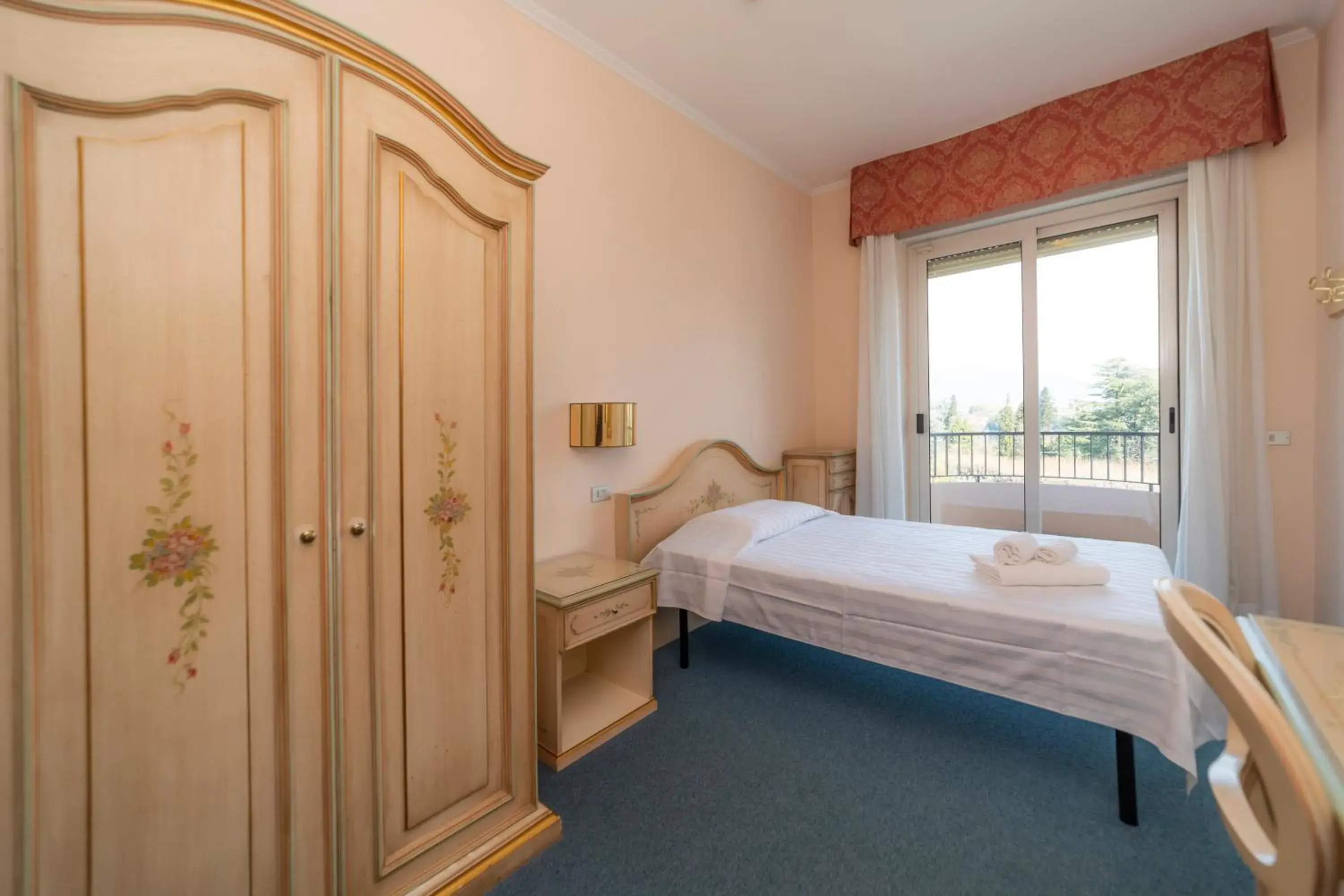 Bedroom in Hotel Della Torre