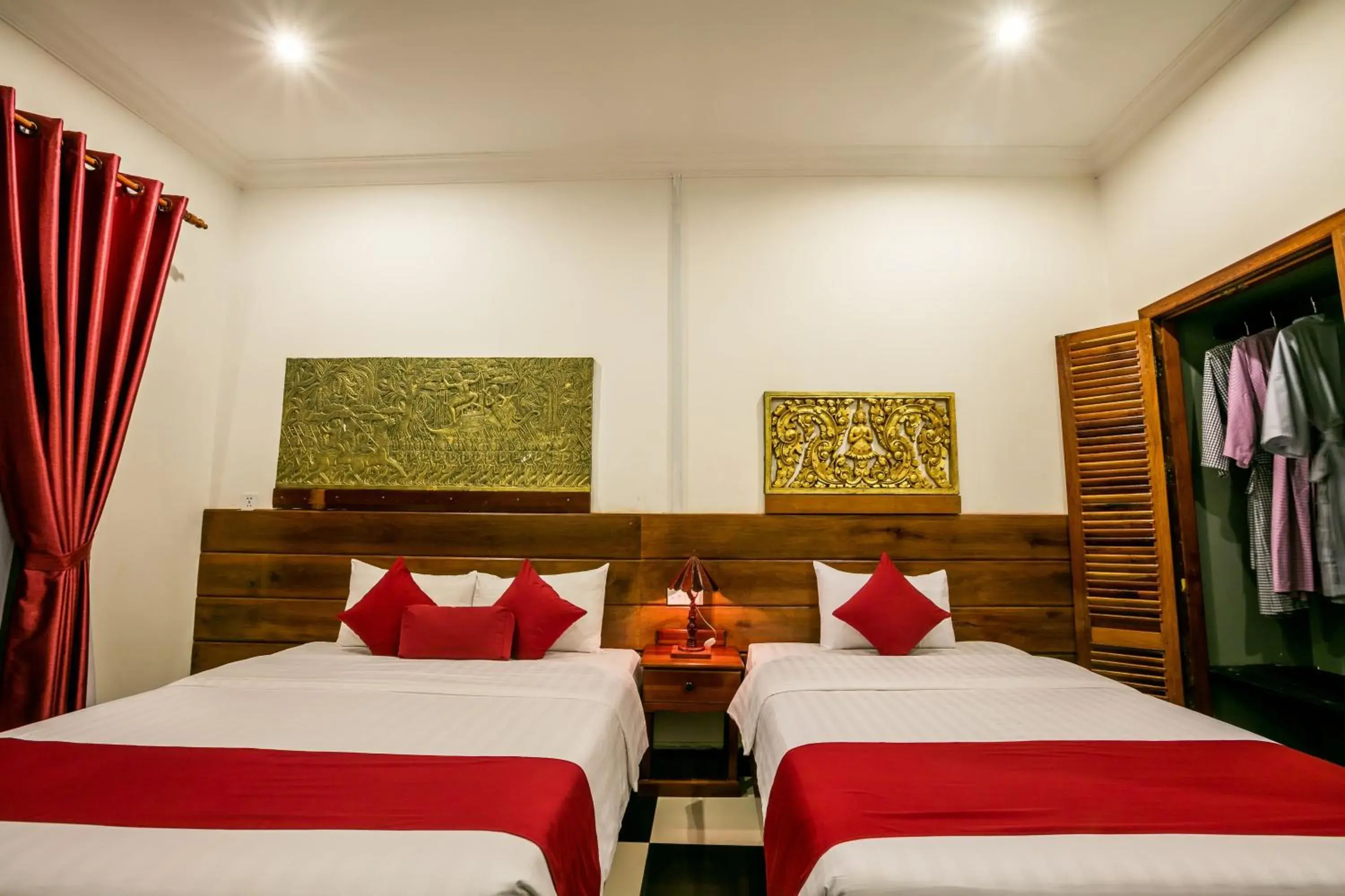 Bed in Asanak D'Angkor Boutique Hotel