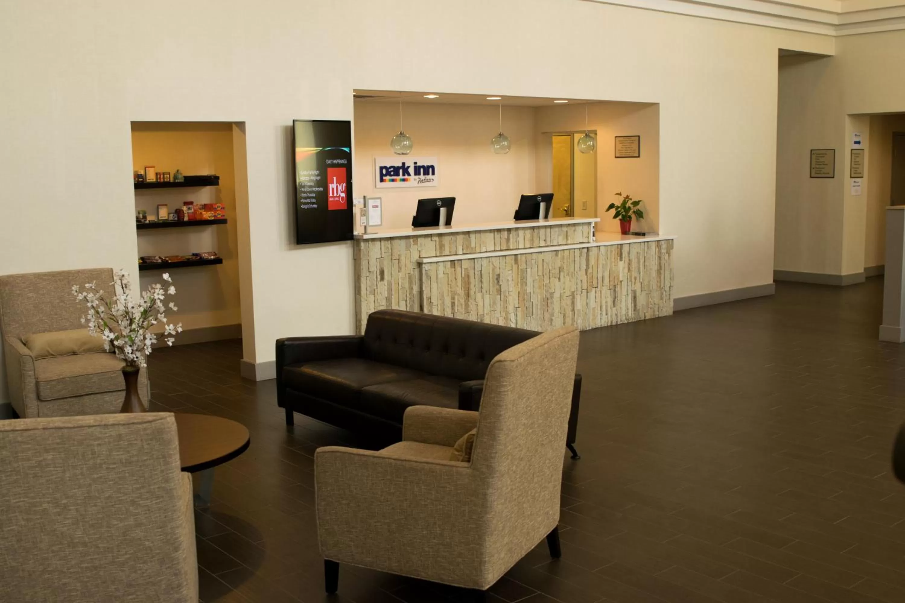 Lobby or reception in Ramada by Wyndham Indiana