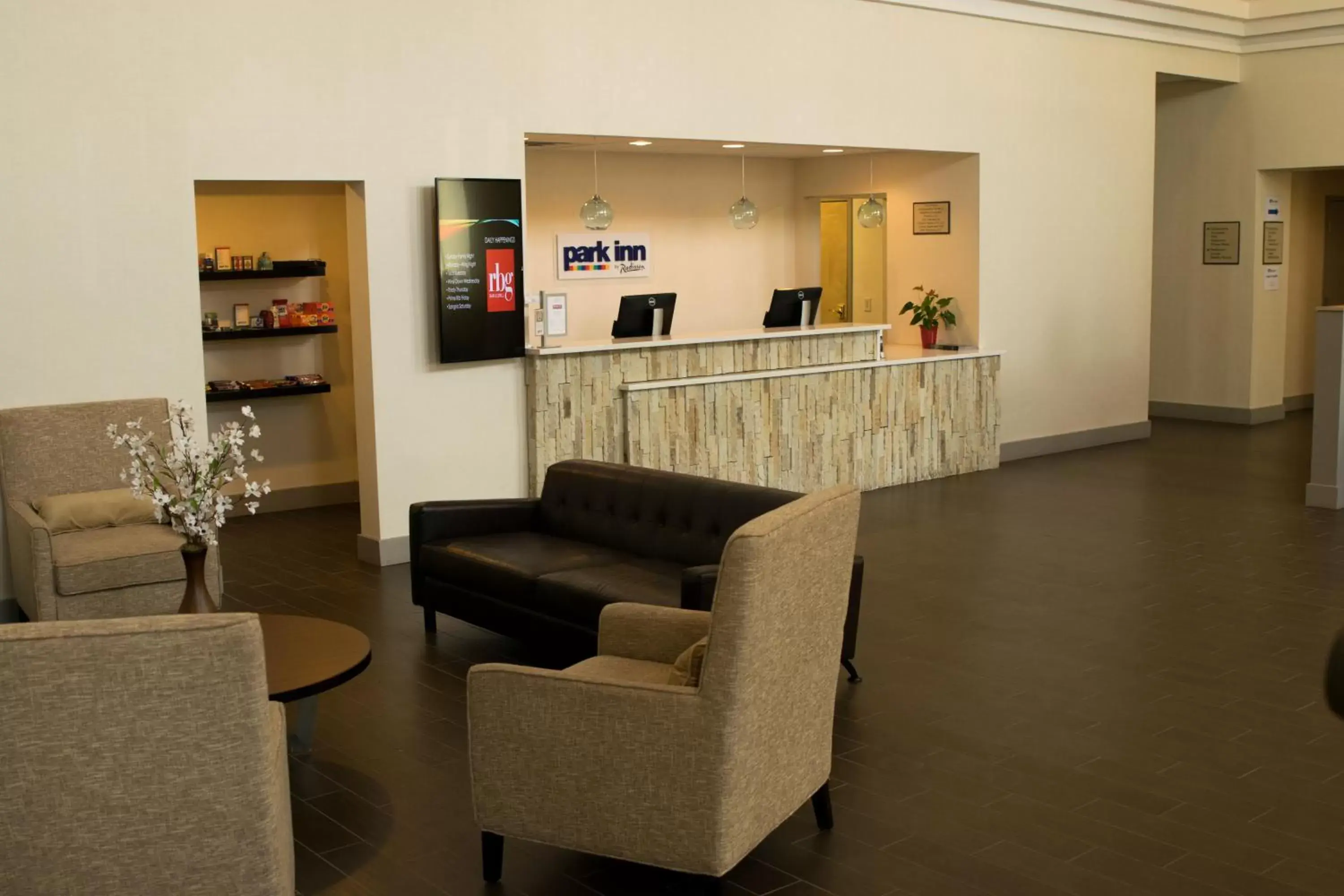 Lobby or reception in Ramada by Wyndham Indiana Lobby or reception in Ramada by Wyndham Indiana