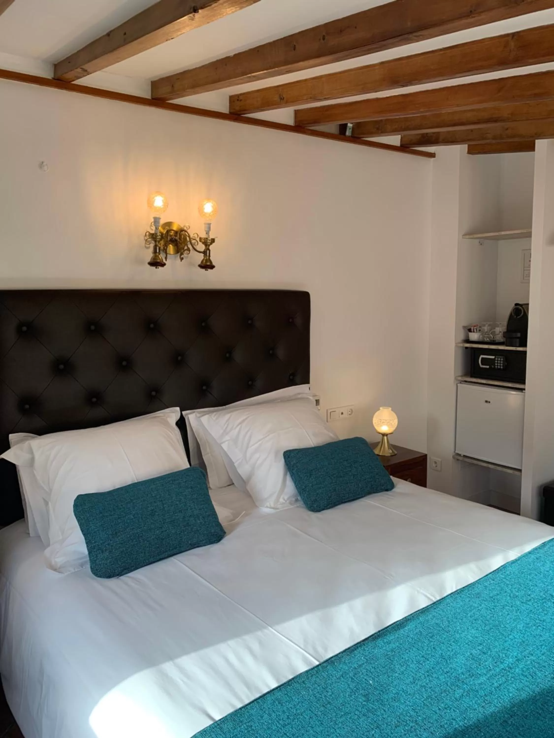 Bed in Hotel Casa Bougainvillea