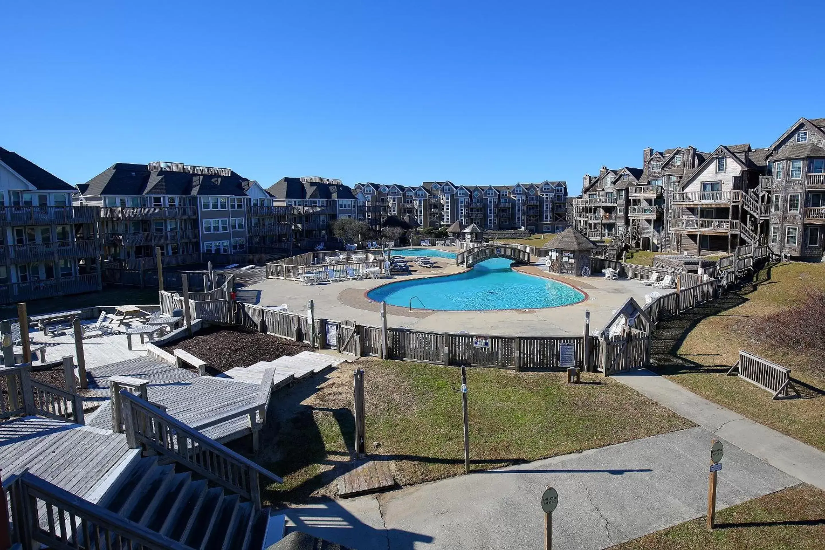 Property building, Pool View in Barrier Island Station, a VRI resort