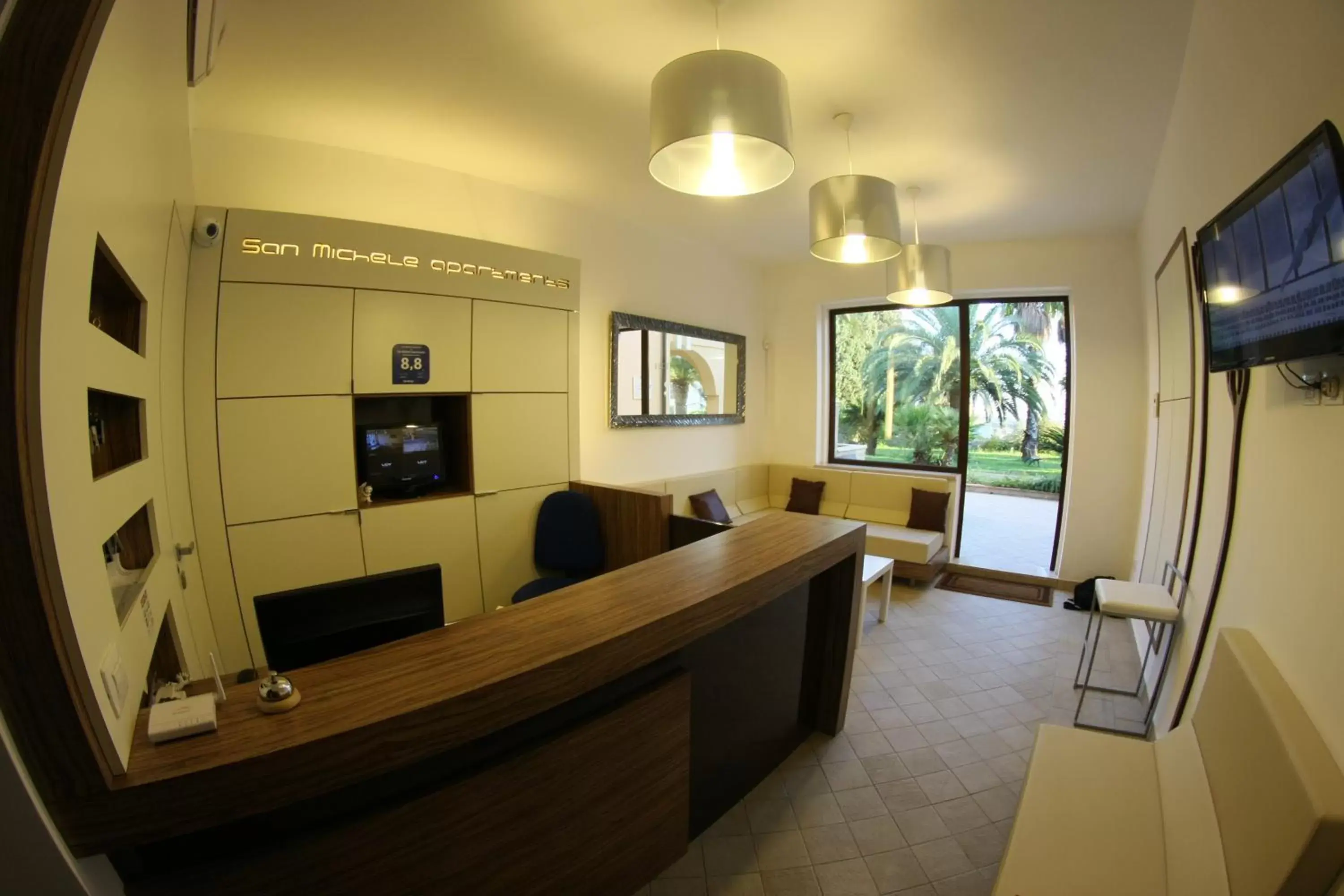 Lobby or reception in San Michele Apartments&Rooms