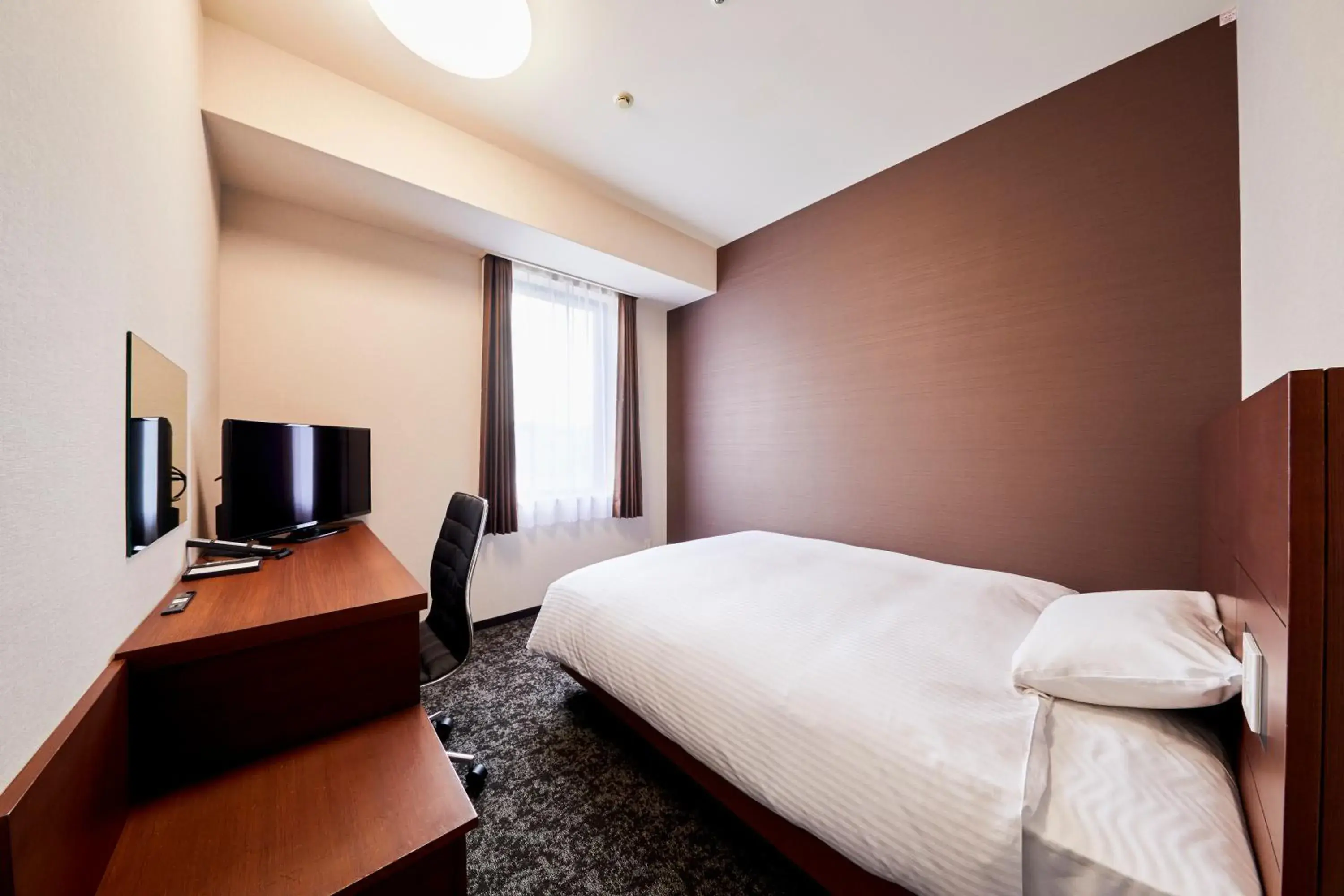 Bed in Hotel Wing International Kobe Shinnagata Ekimae