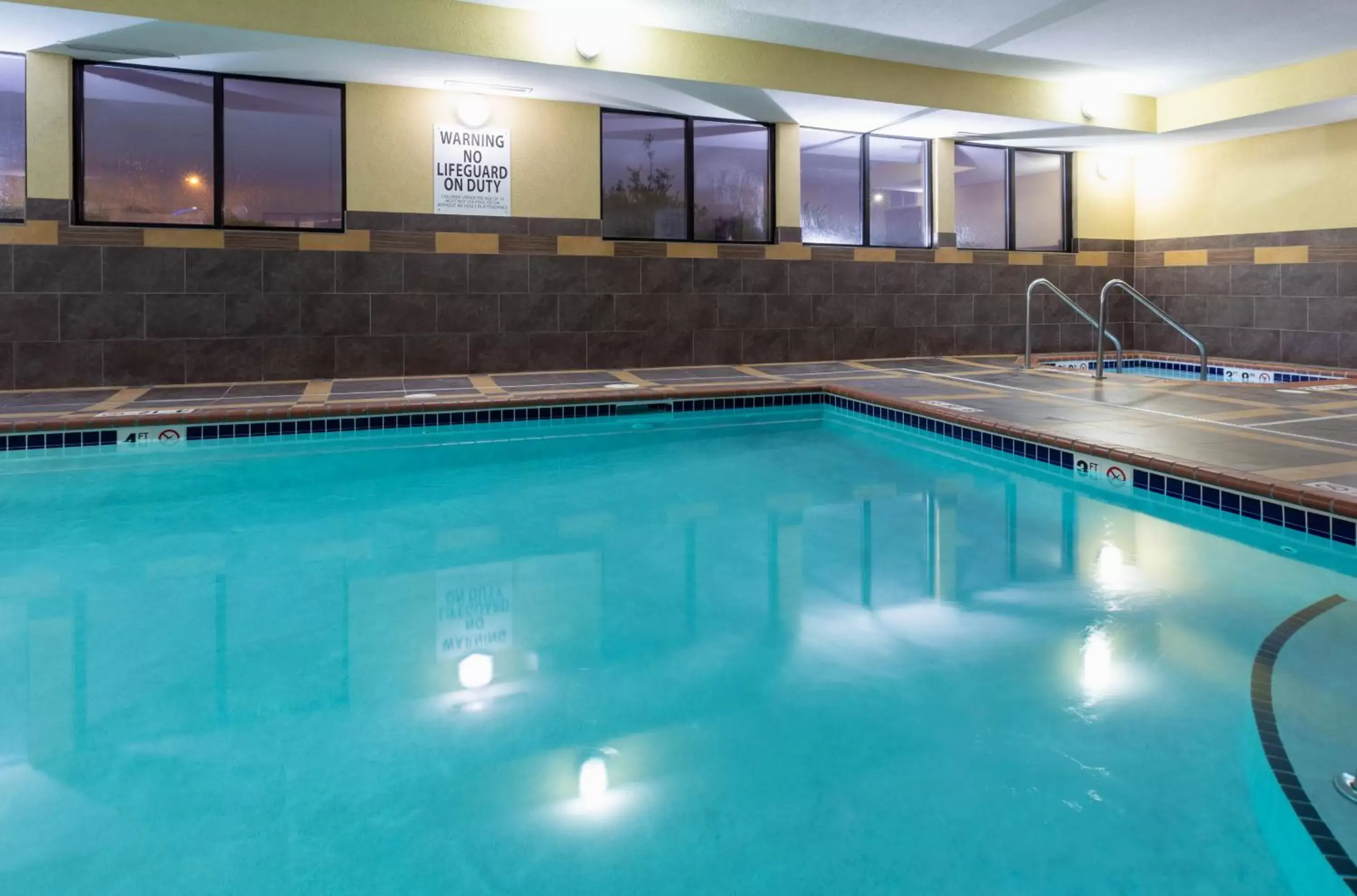 Swimming Pool in Holiday Inn Express and Suites Rochester West-Medical Center, an IHG Hotel