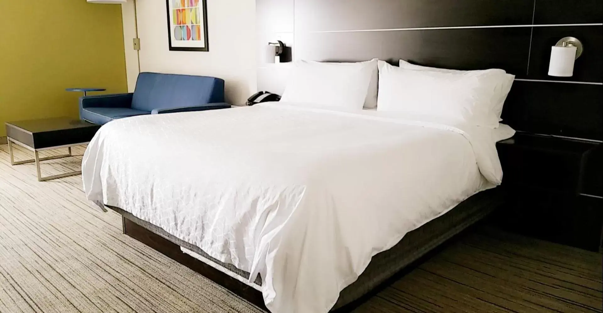 Bed in Holiday Inn Express & Suites Troy, an IHG Hotel
