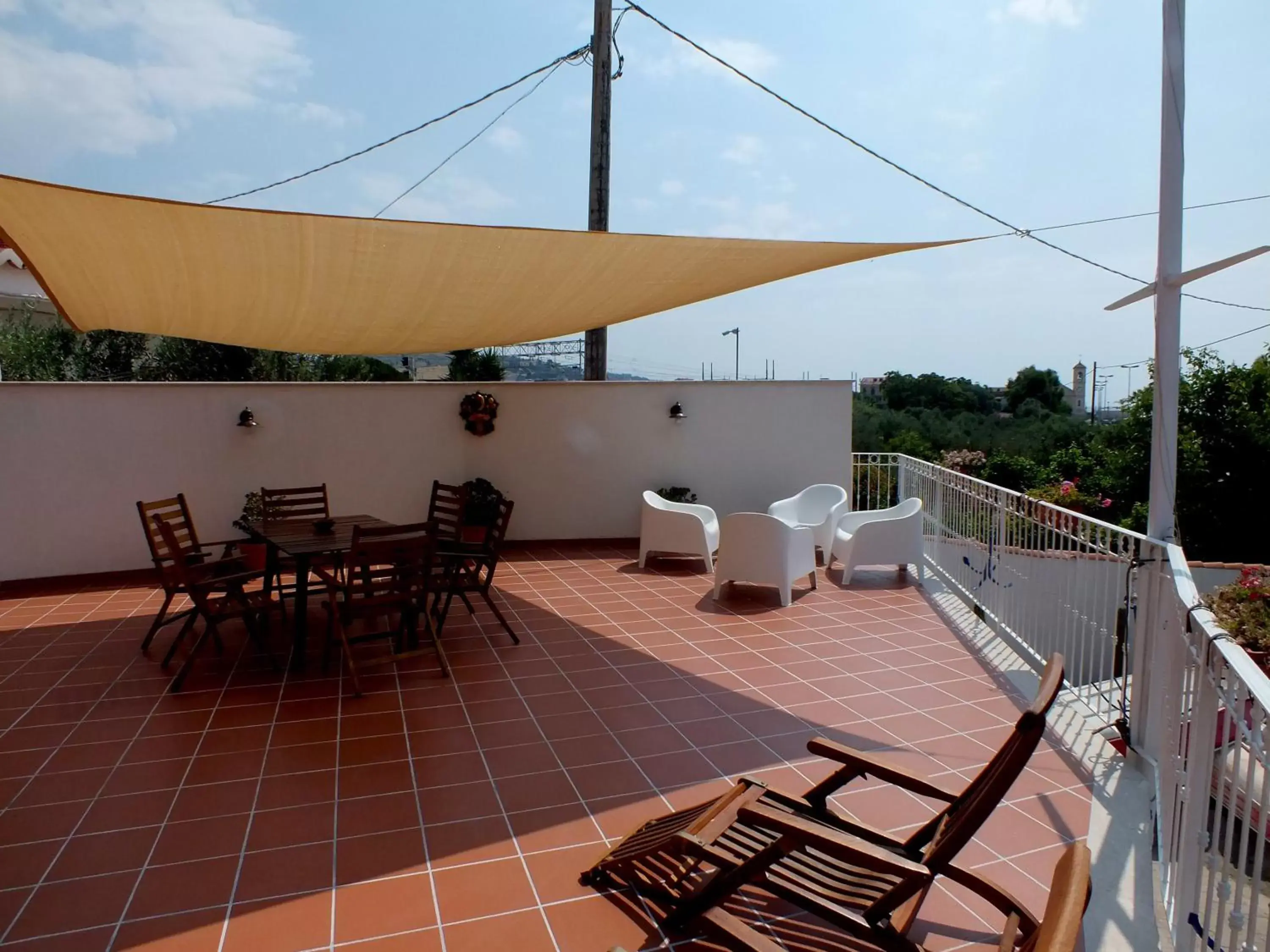 Communal lounge/ TV room in B&B Villa sul Mare