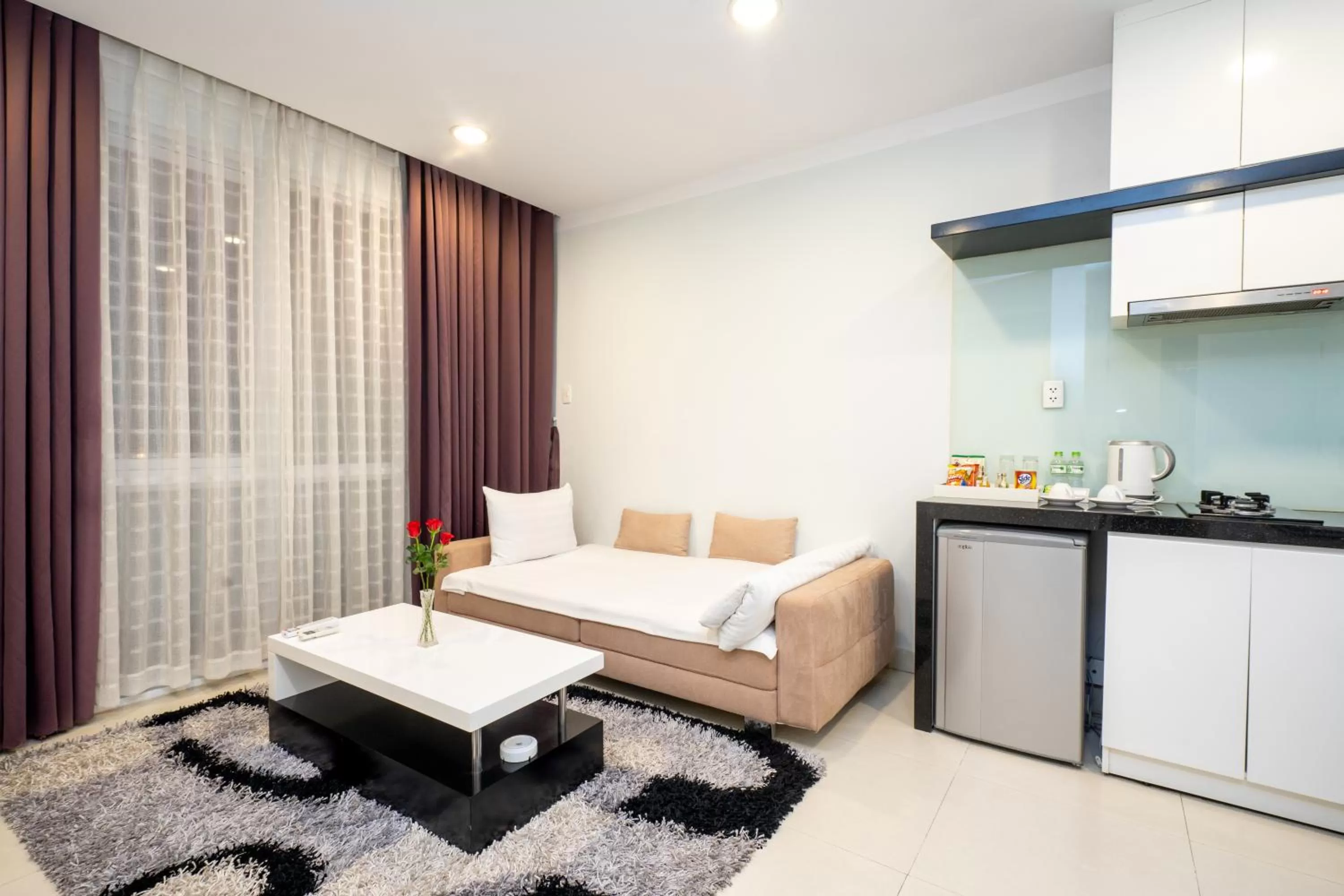 Living room, Bed in Becamex Hotel Thu Dau Mot