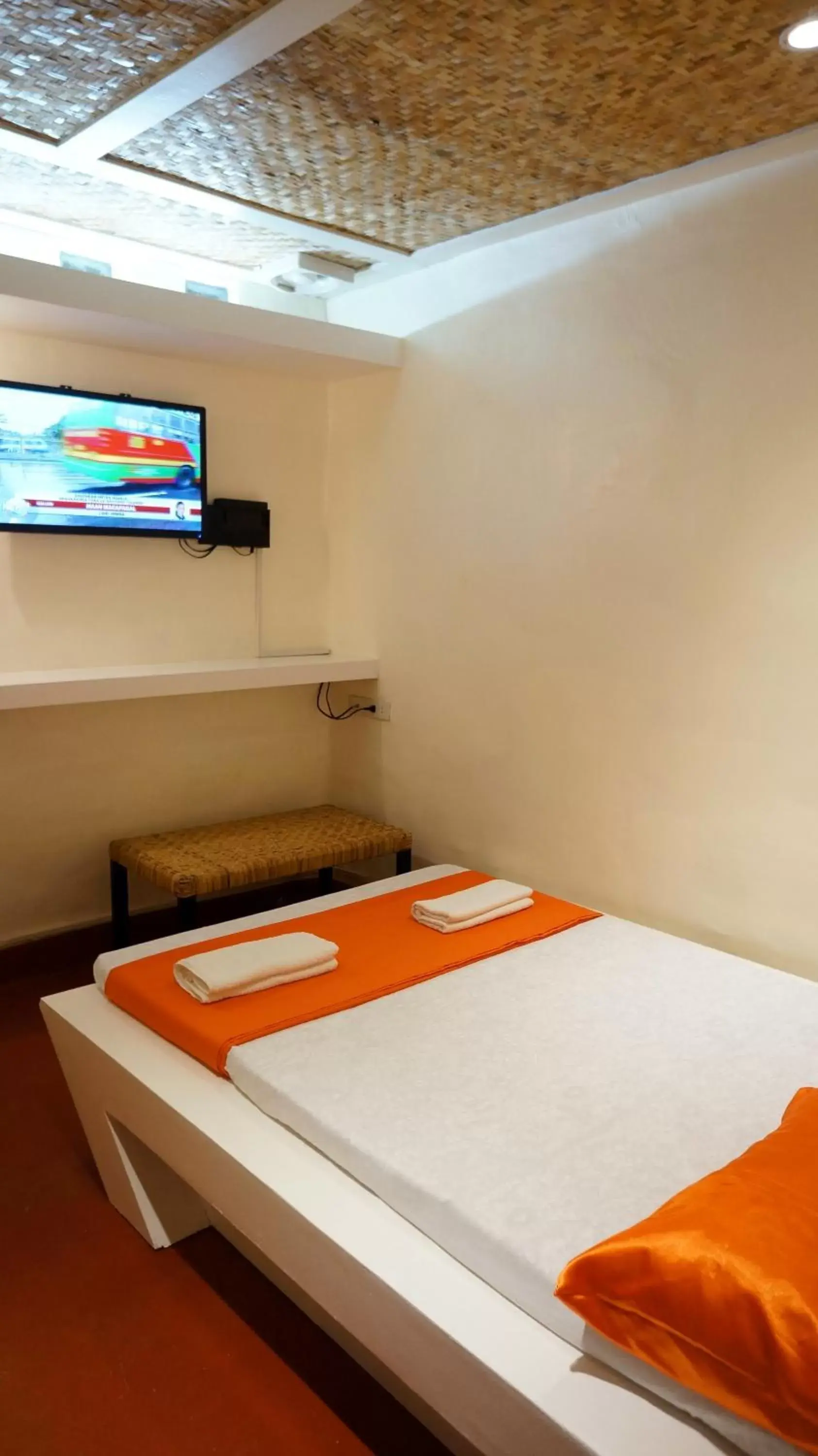 Bed in Orange Mangrove Pension House