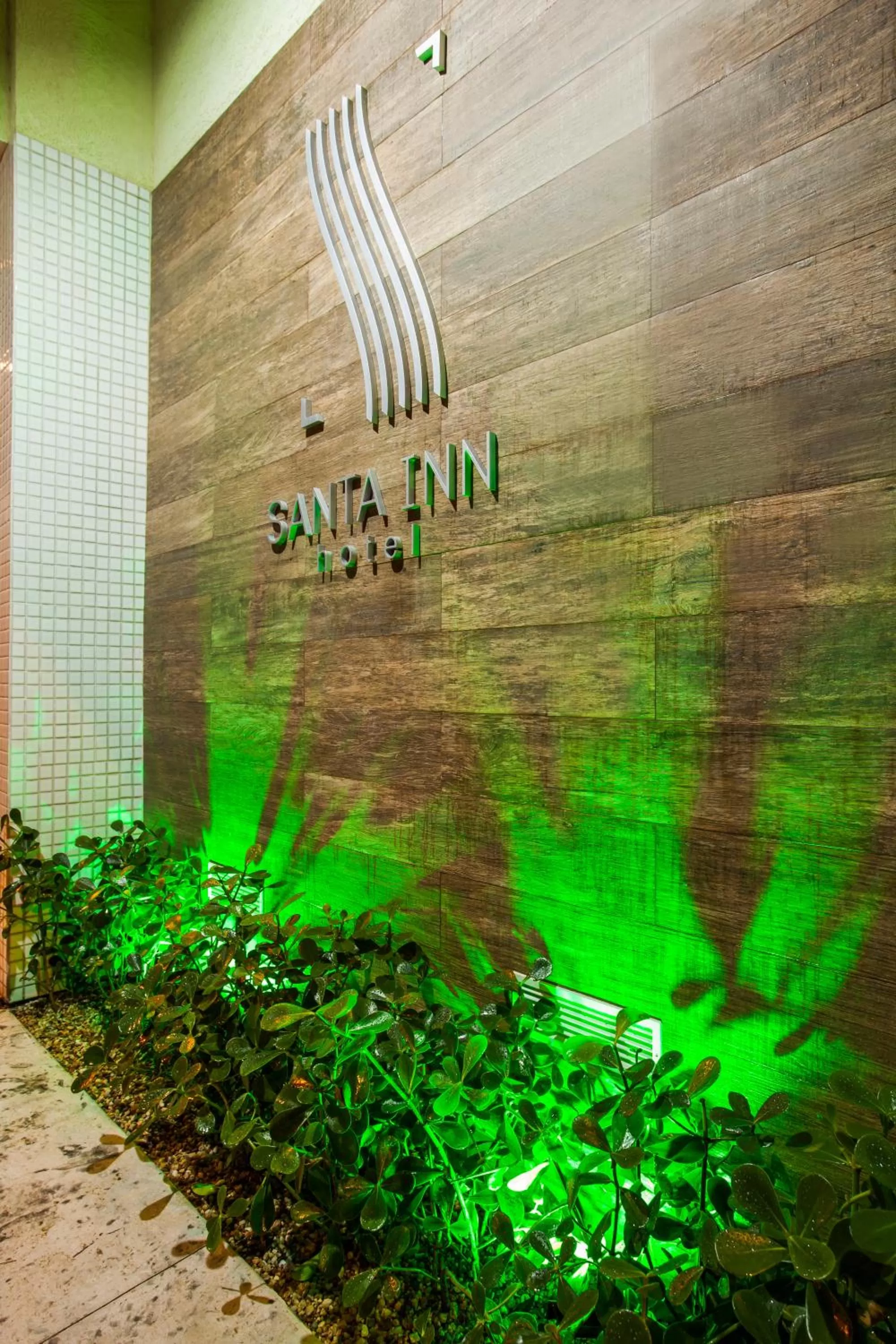 Property logo or sign in Santa Inn Hotel