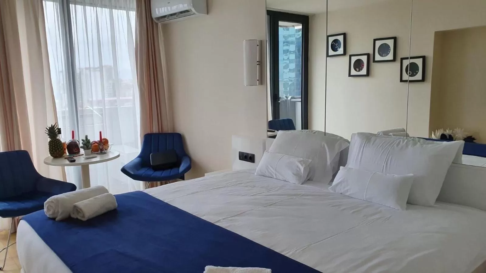 Bed in Orbi City Luxury Suite