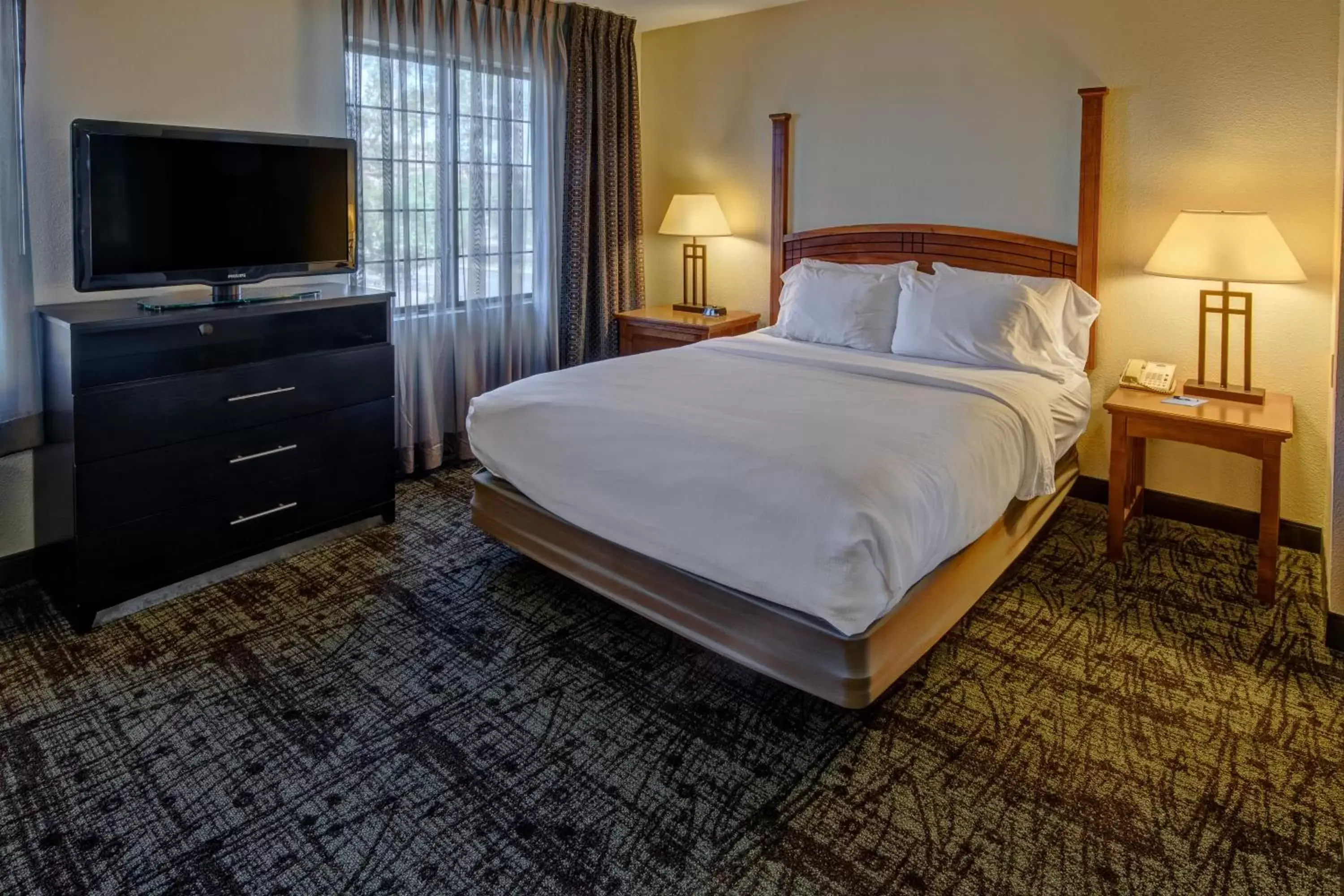 Photo of the whole room, Bed in Staybridge Suites Denver - Cherry Creek, an IHG Hotel